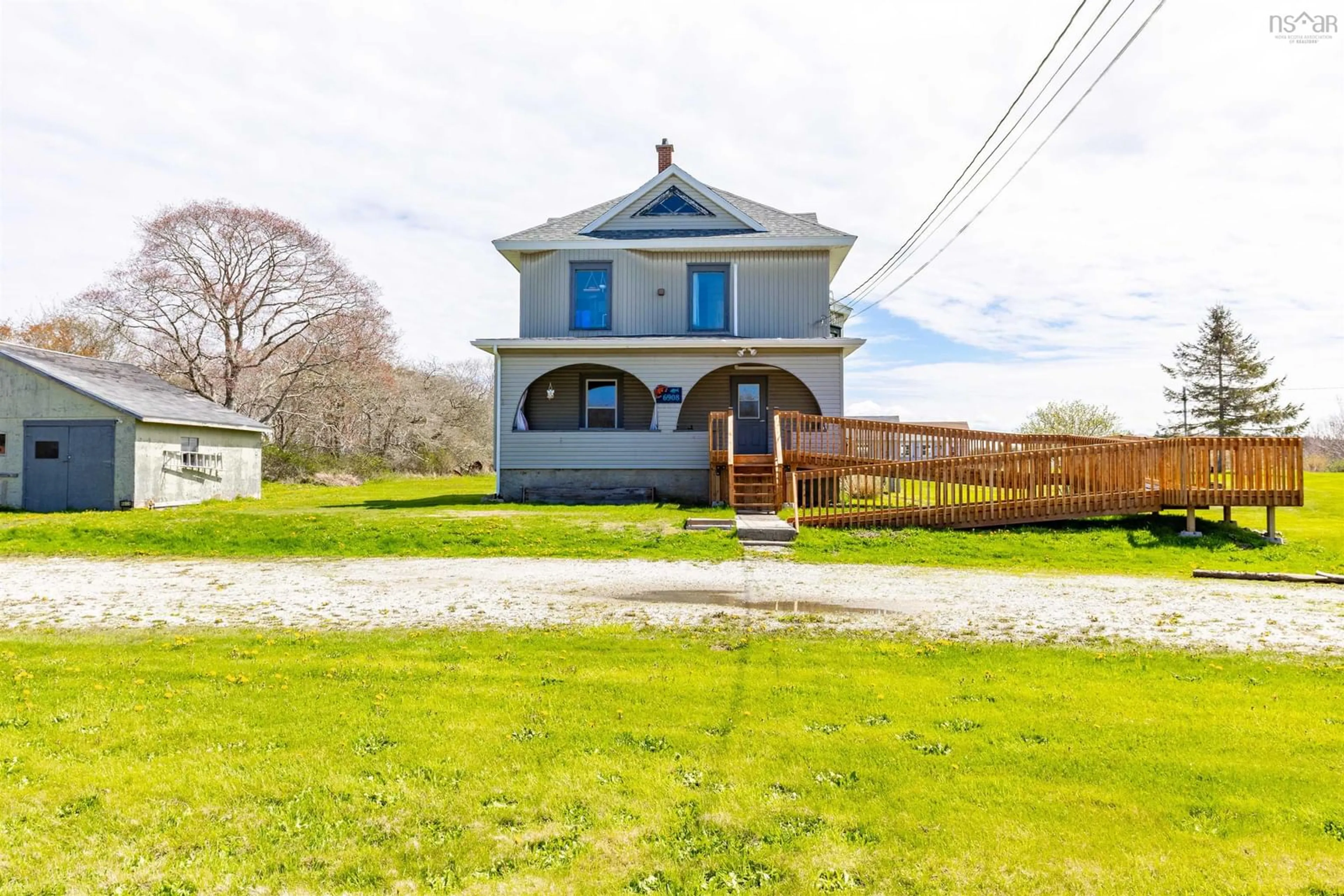 A pic from outside/outdoor area/front of a property/back of a property/a pic from drone, unknown for 6908 Highway 3, Eel Brook Nova Scotia B0W 2X0