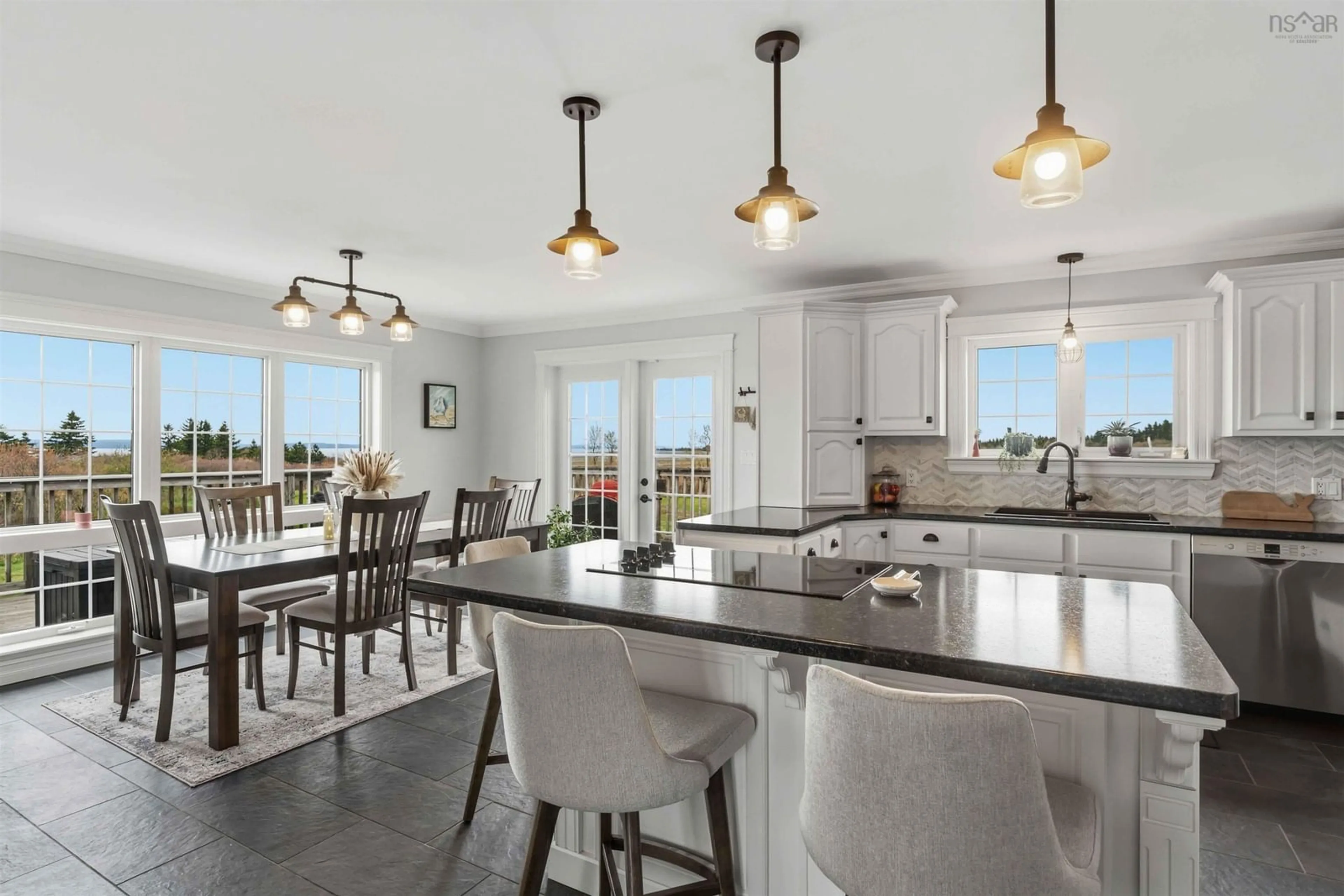 Open concept kitchen, ceramic/tile floor for 63 Chemin Dixon Rd, Grosses Coques Nova Scotia B0W 1M0