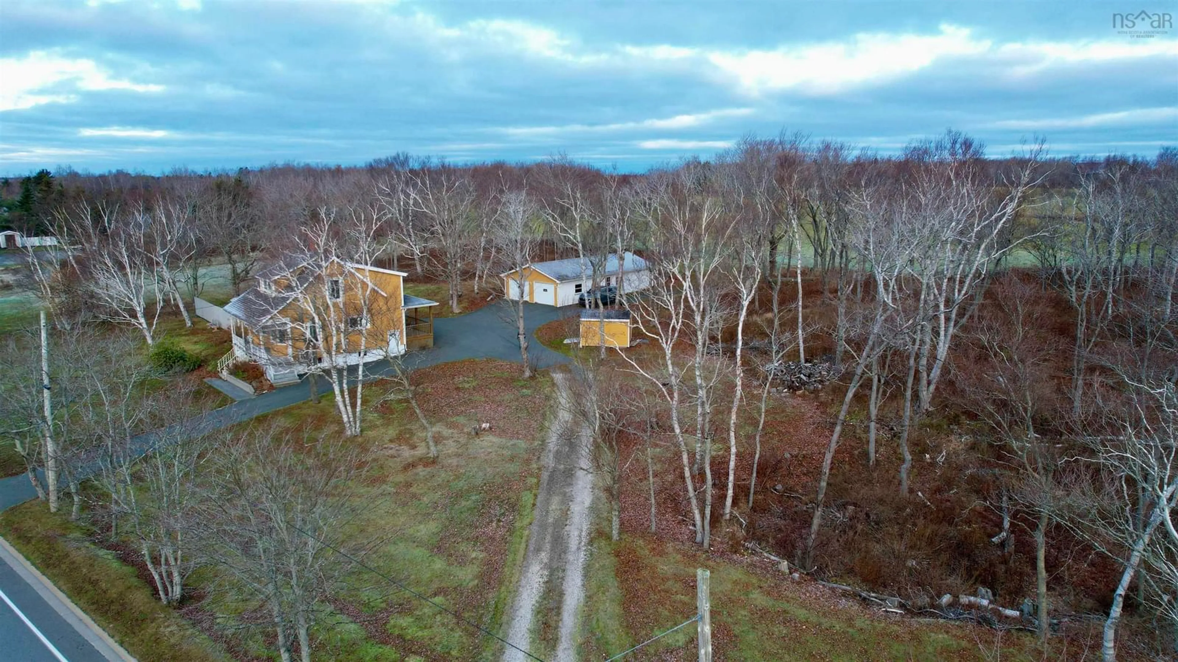 A pic from outside/outdoor area/front of a property/back of a property/a pic from drone, forest/trees view for 219 Dominion St, Glace Bay Nova Scotia B1A 3N2
