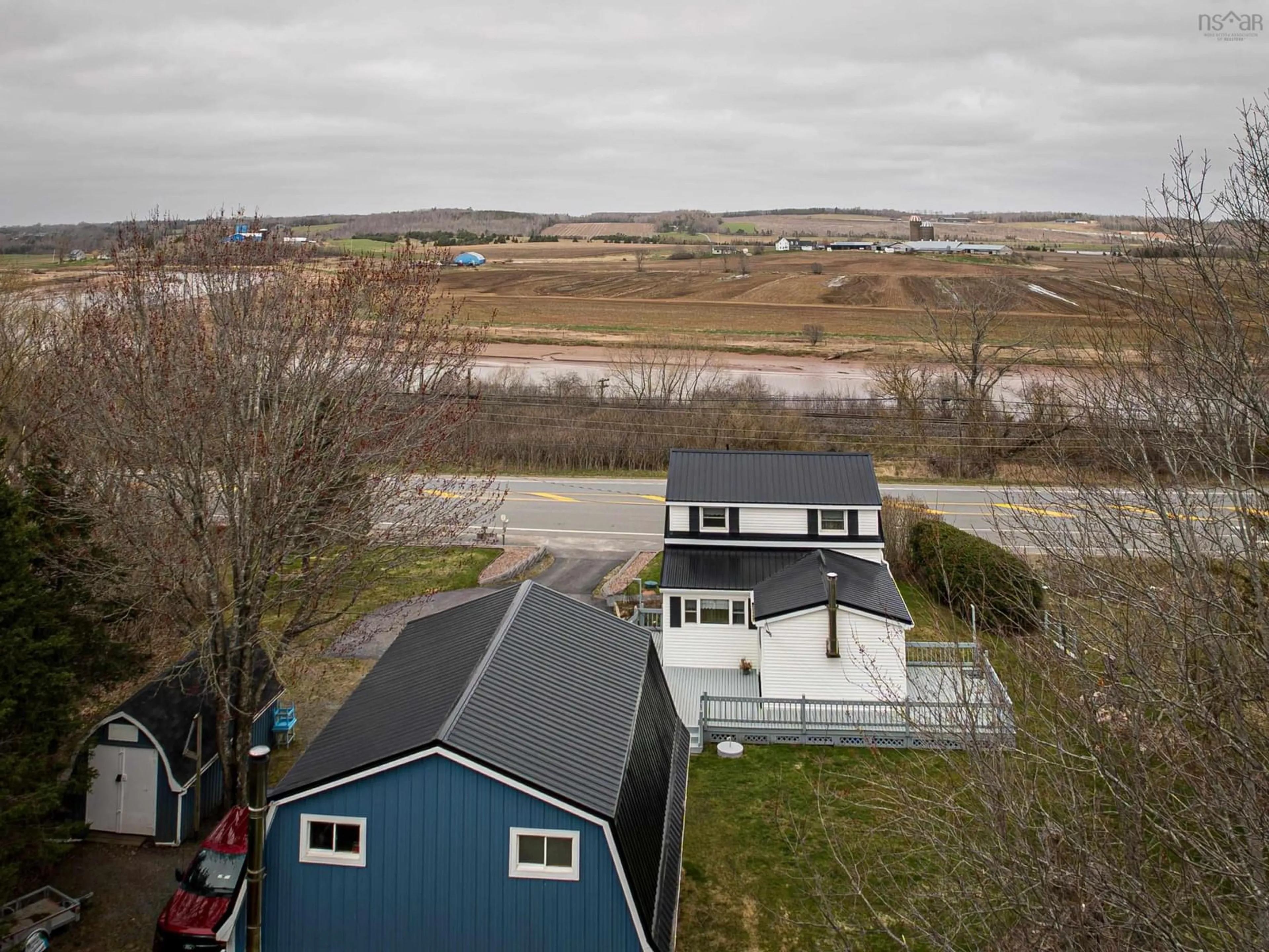 A pic from outside/outdoor area/front of a property/back of a property/a pic from drone, water/lake/river/ocean view for 21141 Highway 2, Shubenacadie East Nova Scotia B0N 2H0