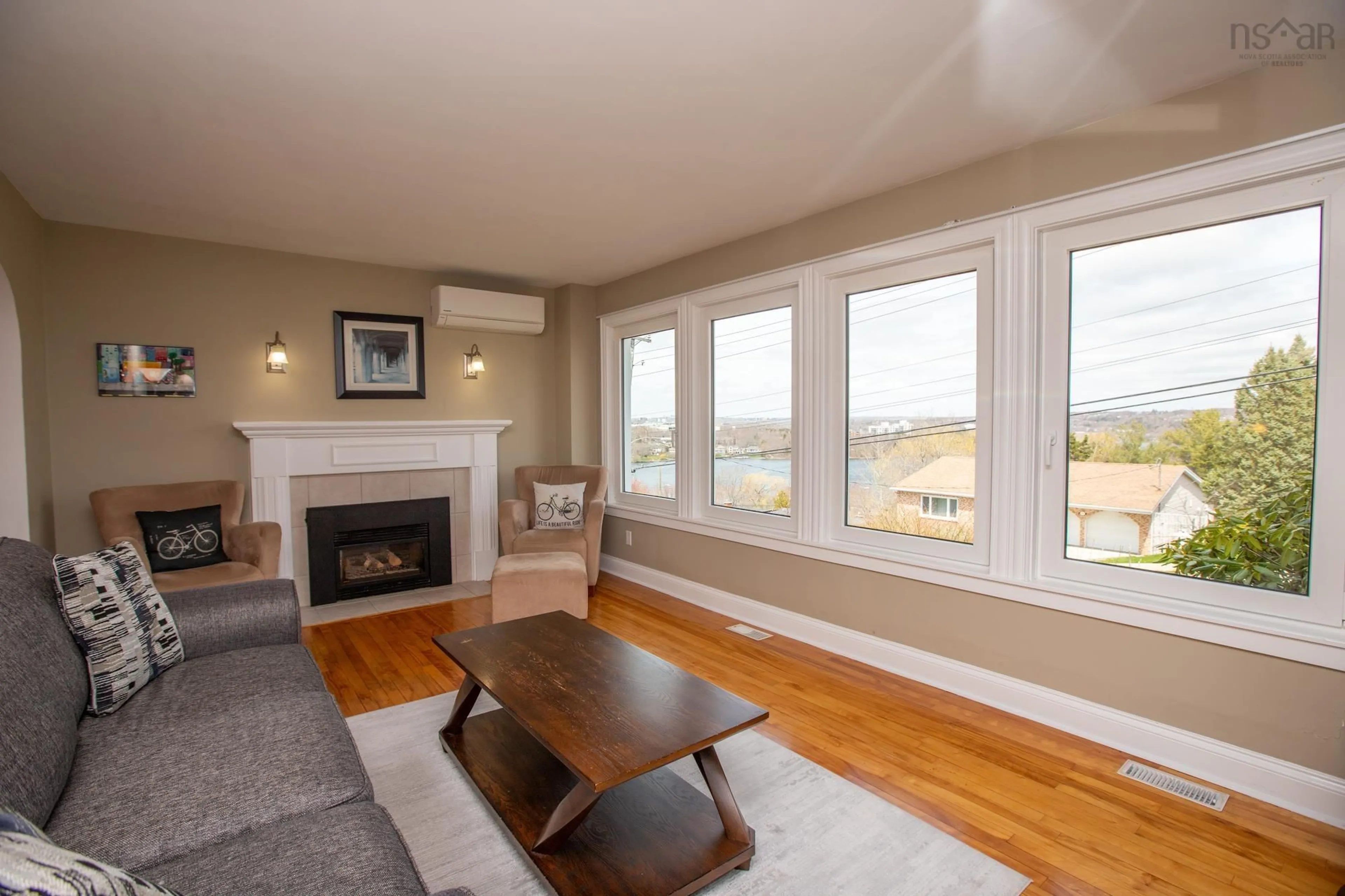 Living room with furniture, wood/laminate floor for 273 Joffre St, Dartmouth Nova Scotia B2Y 3E2