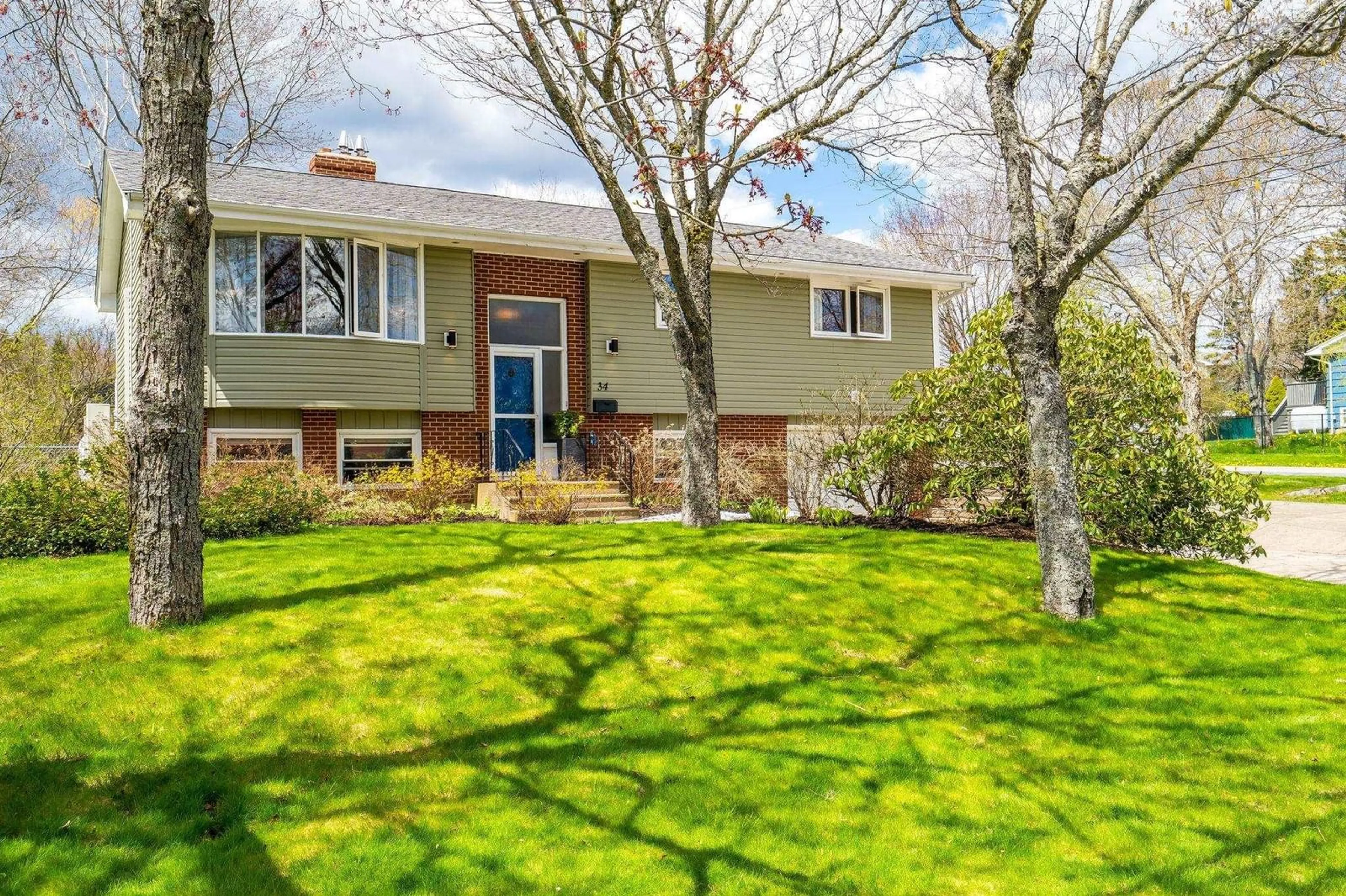 Home with vinyl exterior material, street for 34 Wildwood Boulevard, Woodlawn Nova Scotia B2W 2L8