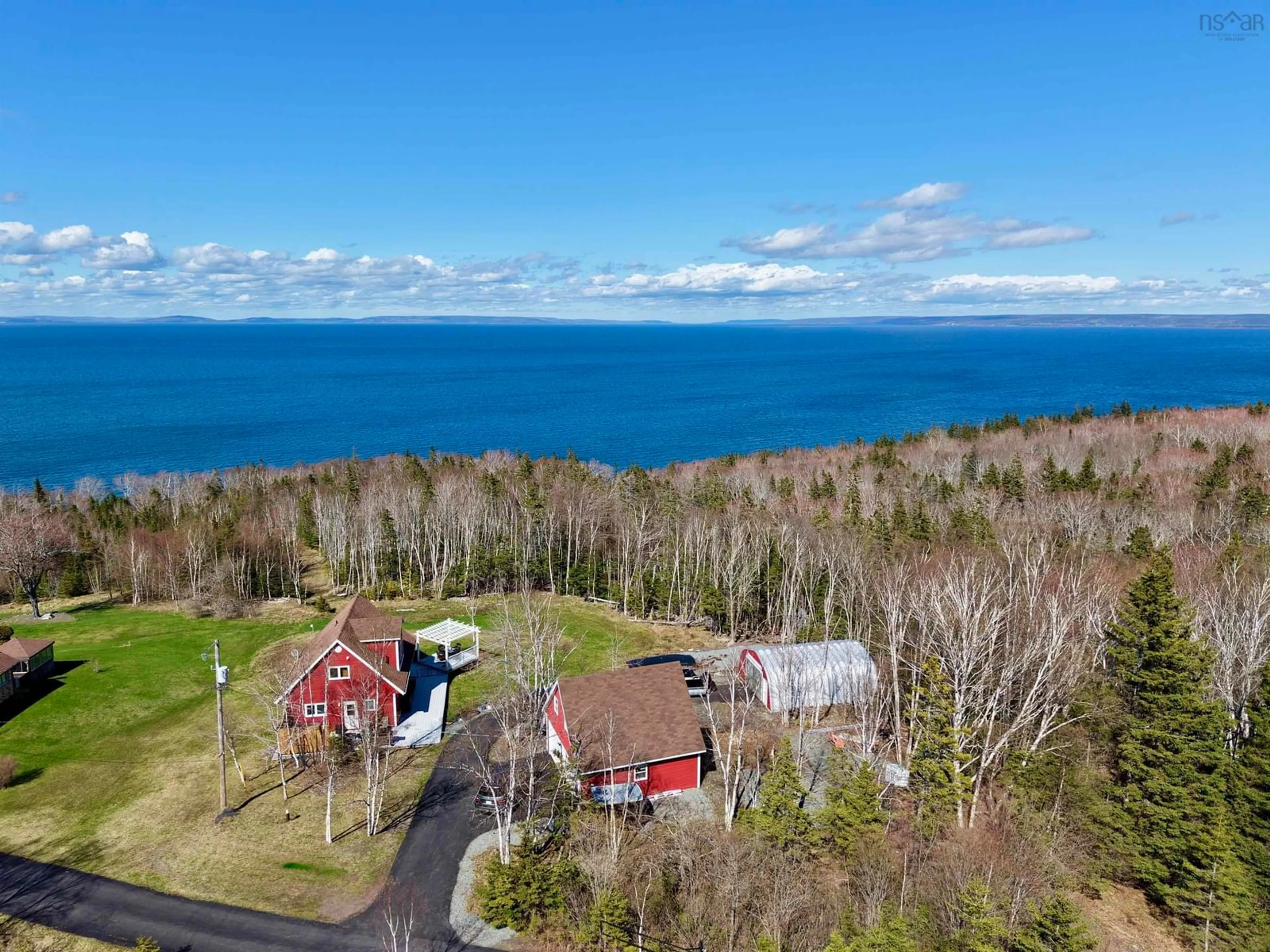 A pic from outside/outdoor area/front of a property/back of a property/a pic from drone, water/lake/river/ocean view for West Bay Rd. #6039, Roberta Nova Scotia B0E 3K0