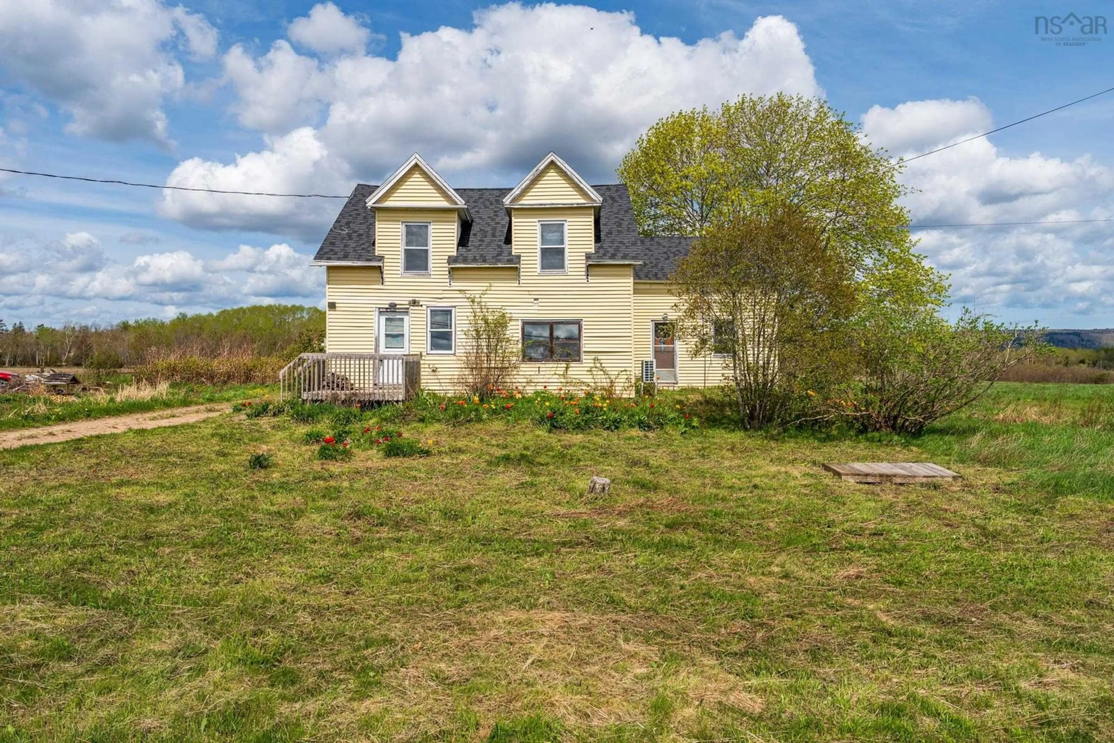 A pic from outside/outdoor area/front of a property/back of a property/a pic from drone, building for 10811 Highway 1, Paradise Nova Scotia B0S 1M0