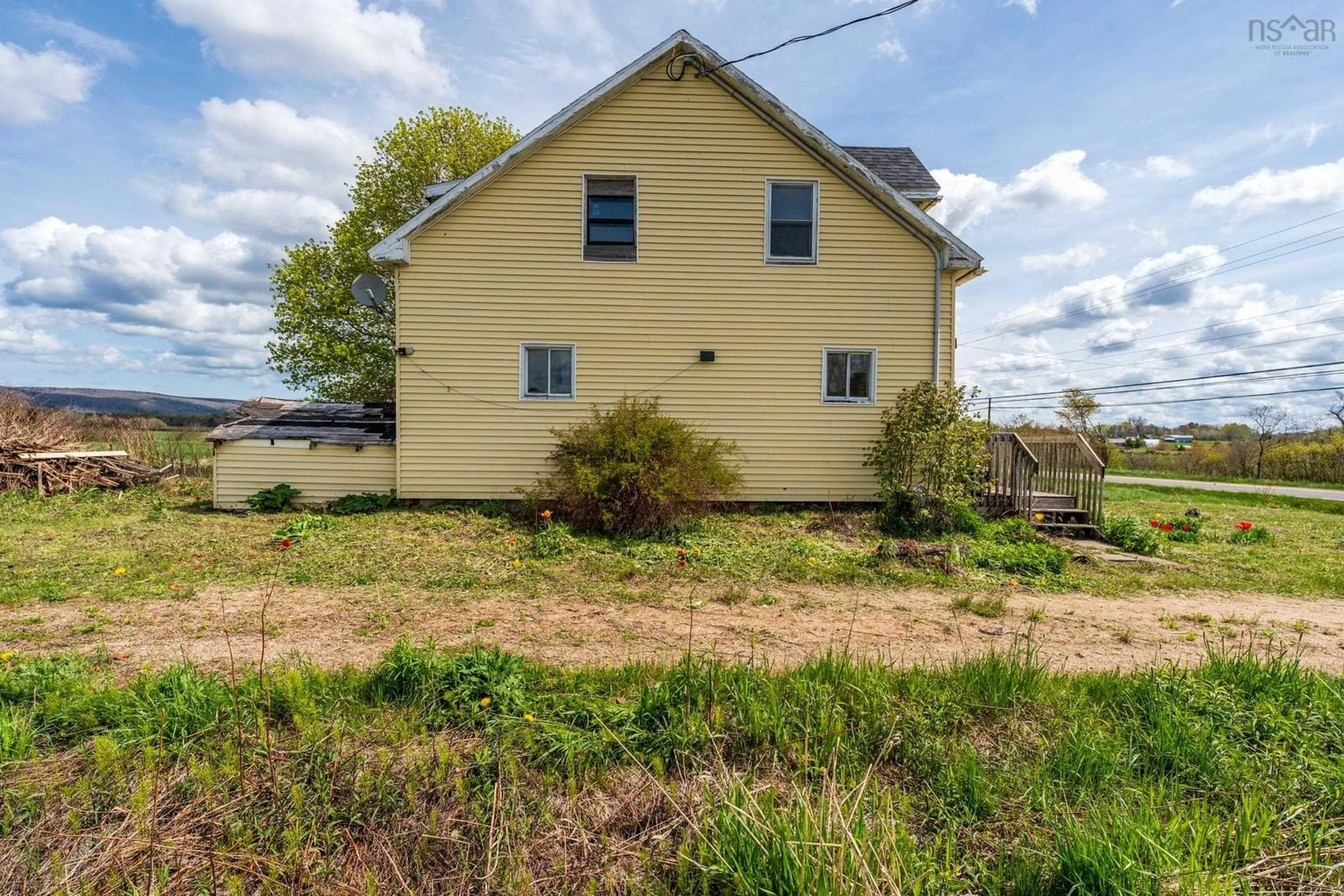 A pic from outside/outdoor area/front of a property/back of a property/a pic from drone, building for 10811 Highway 1, Paradise Nova Scotia B0S 1M0