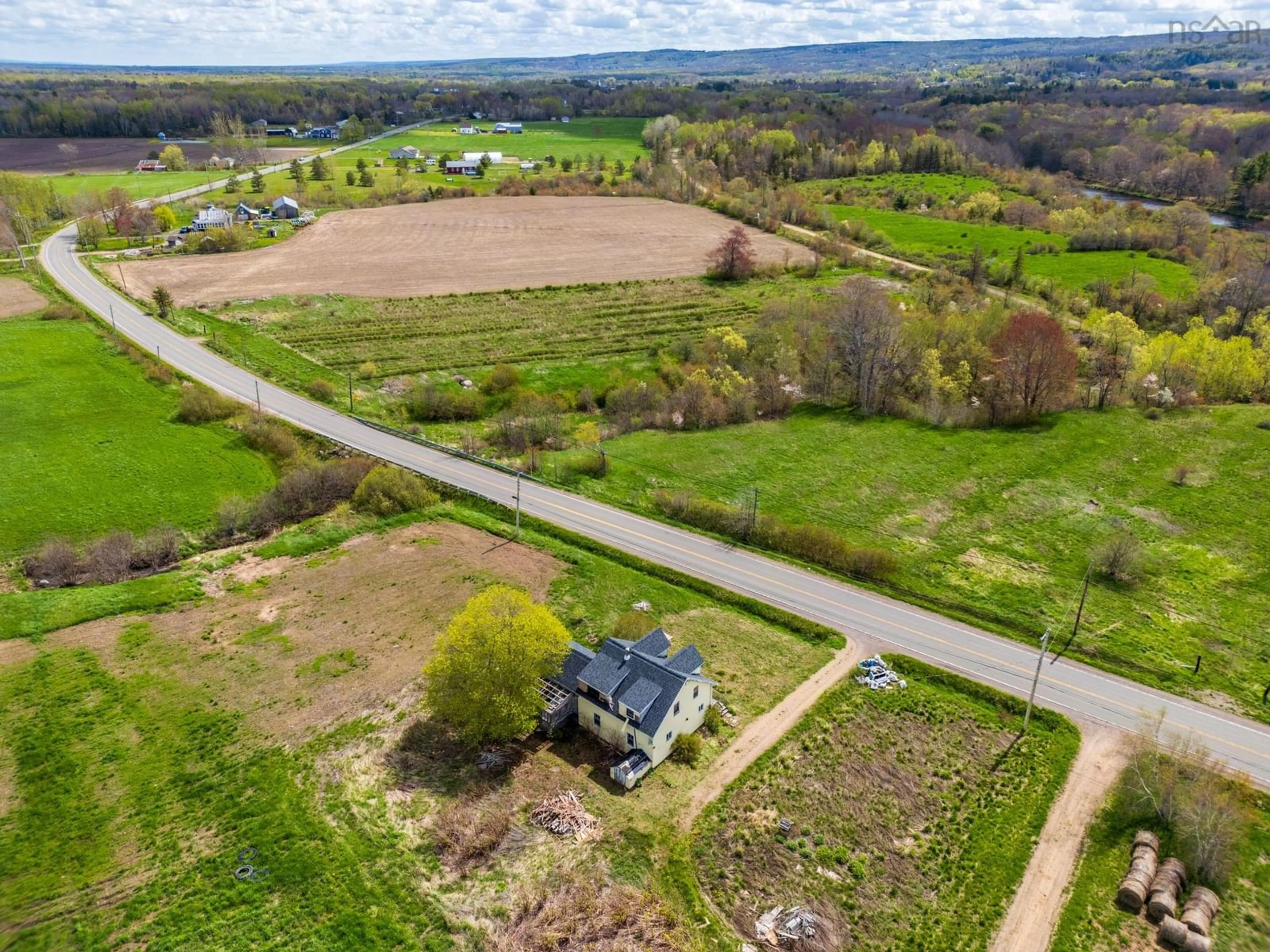 A pic from outside/outdoor area/front of a property/back of a property/a pic from drone, street for 10811 Highway 1, Paradise Nova Scotia B0S 1M0