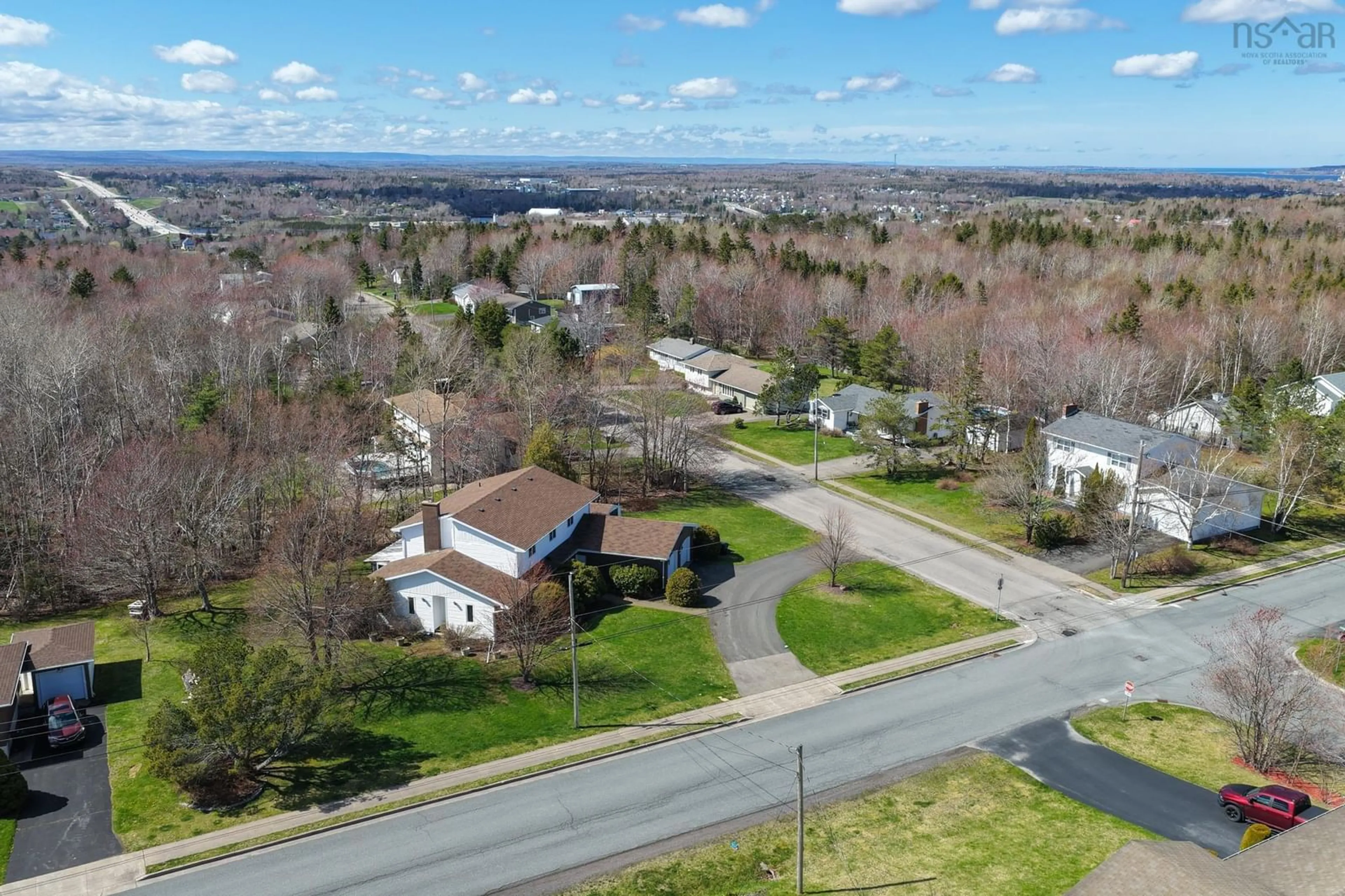 A pic from outside/outdoor area/front of a property/back of a property/a pic from drone, street for 206 Fatima Dr, Sydney River Nova Scotia B1S 1L8