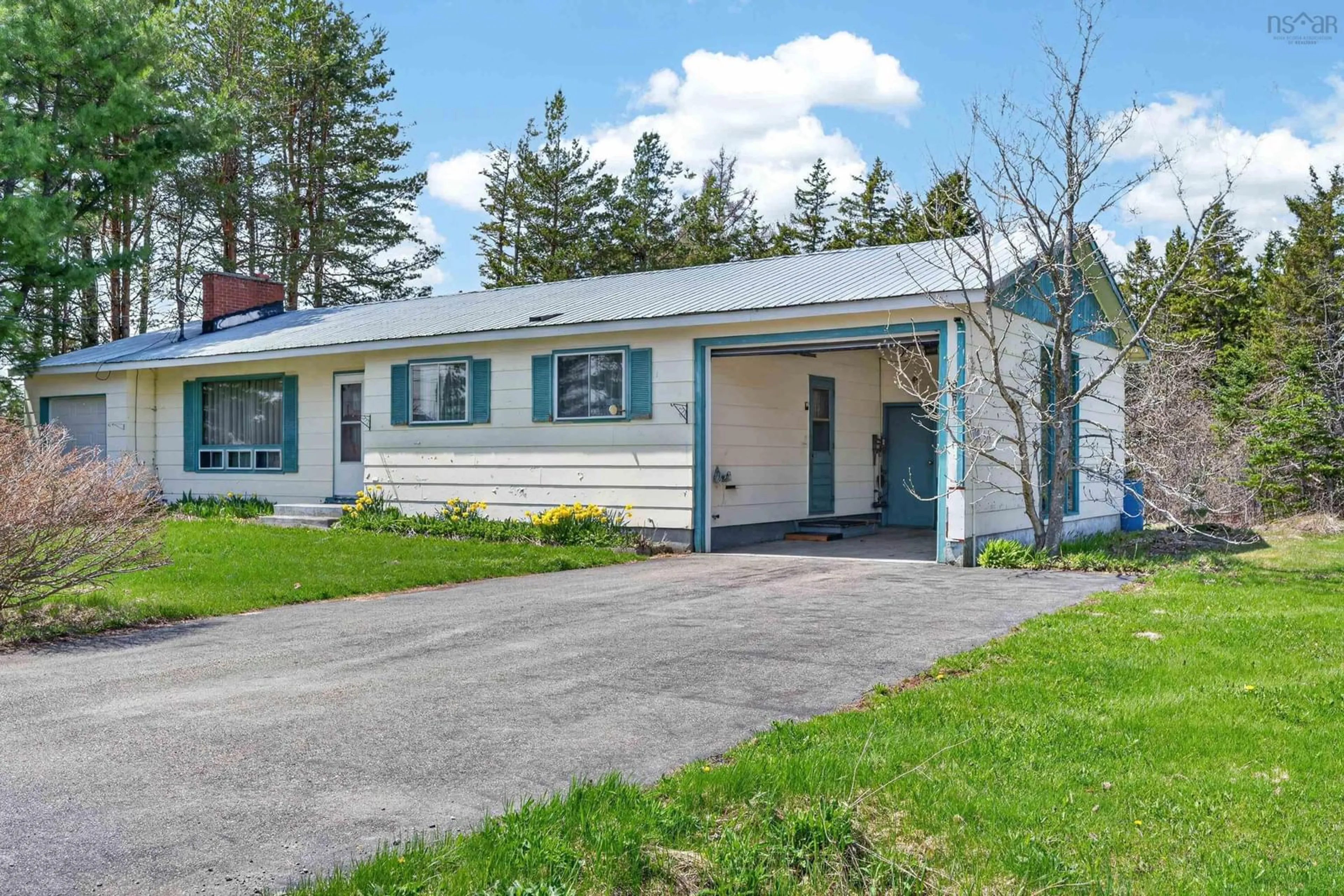 Home with vinyl exterior material, street for 9 Maclellan Ave, Sydney Forks Nova Scotia B1L 1A1