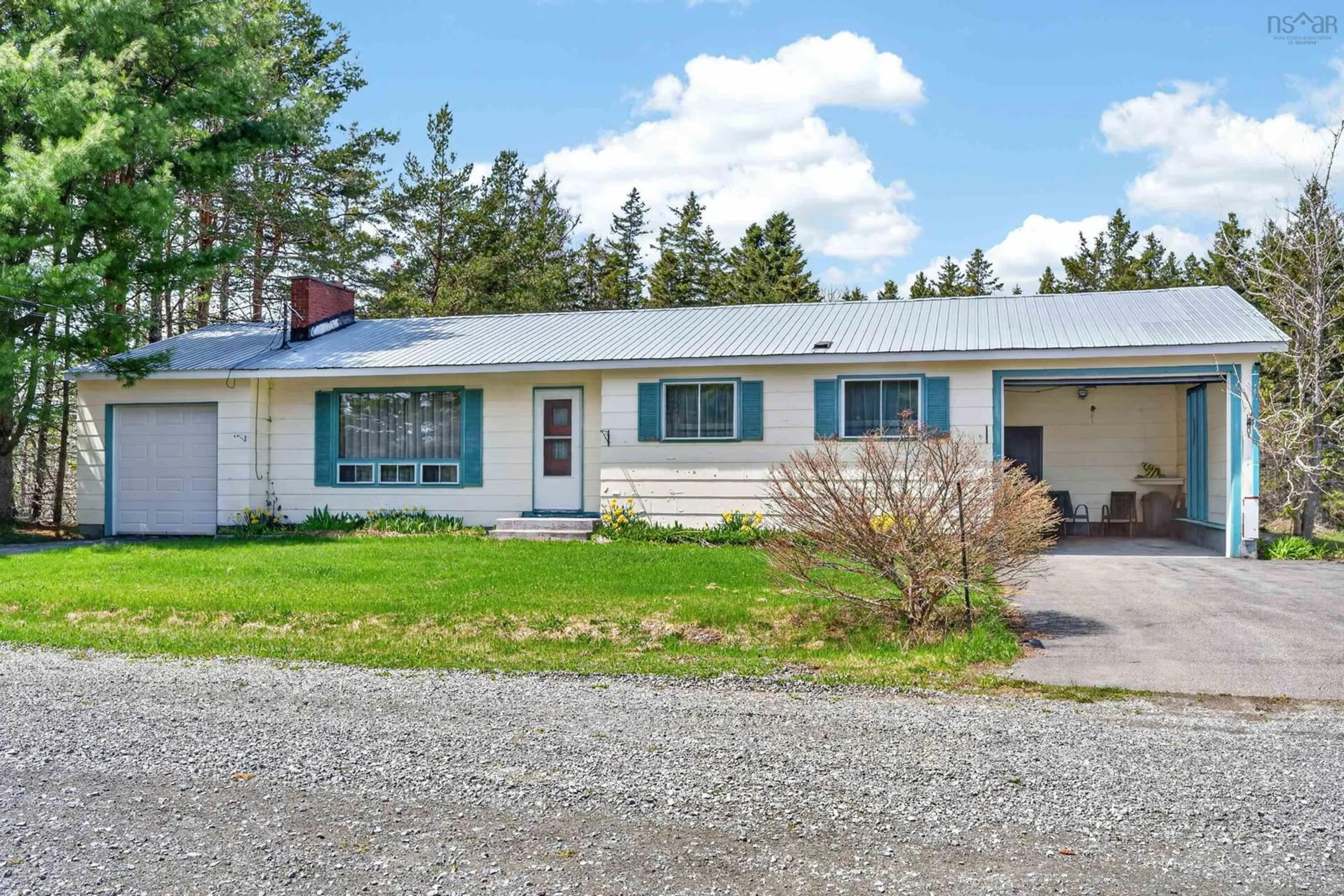 Home with vinyl exterior material, street for 9 Maclellan Ave, Sydney Forks Nova Scotia B1L 1A1