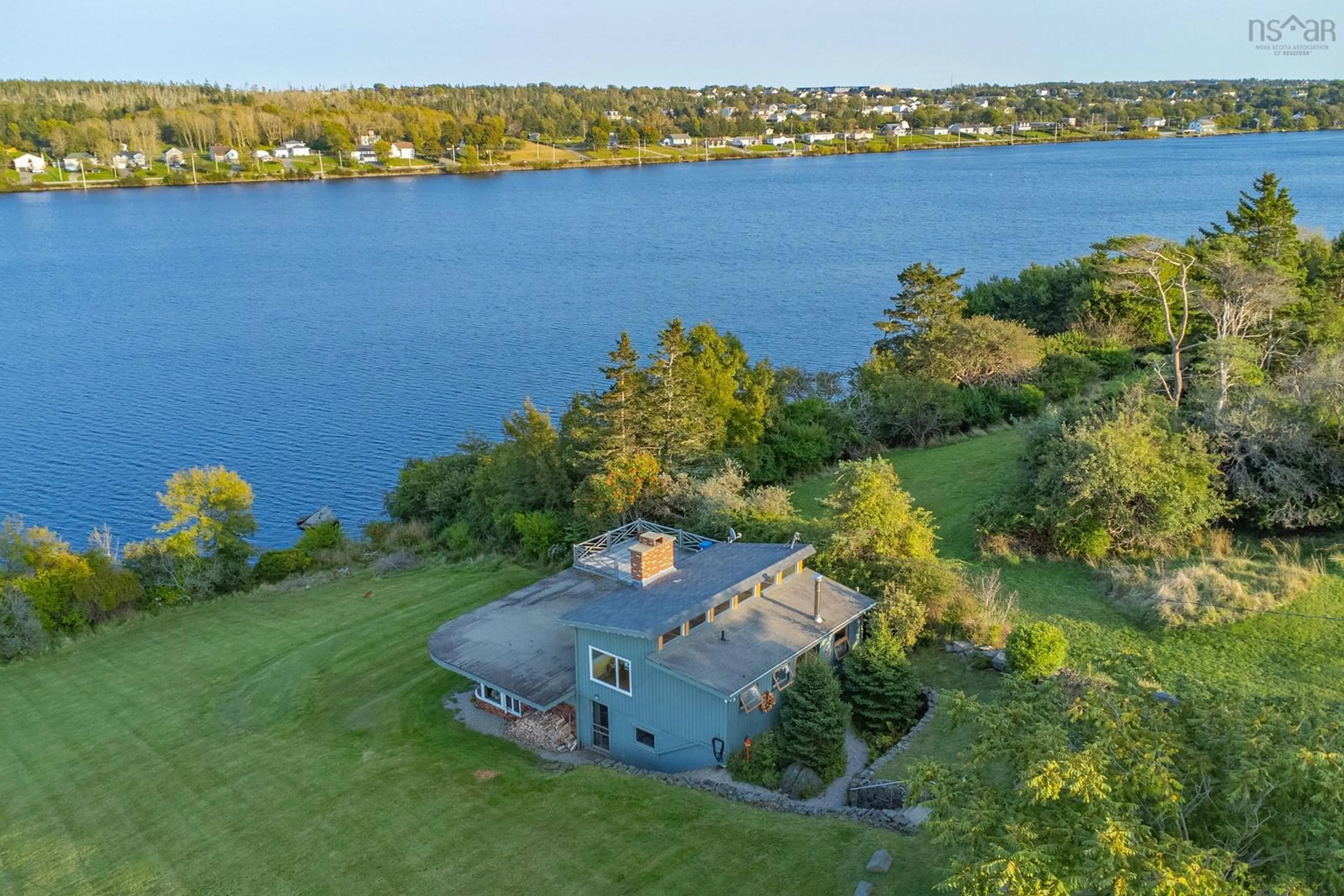 A pic from outside/outdoor area/front of a property/back of a property/a pic from drone, water/lake/river/ocean view for 845 Lakeside Rd, Milton Highlands Nova Scotia B5A 5K2