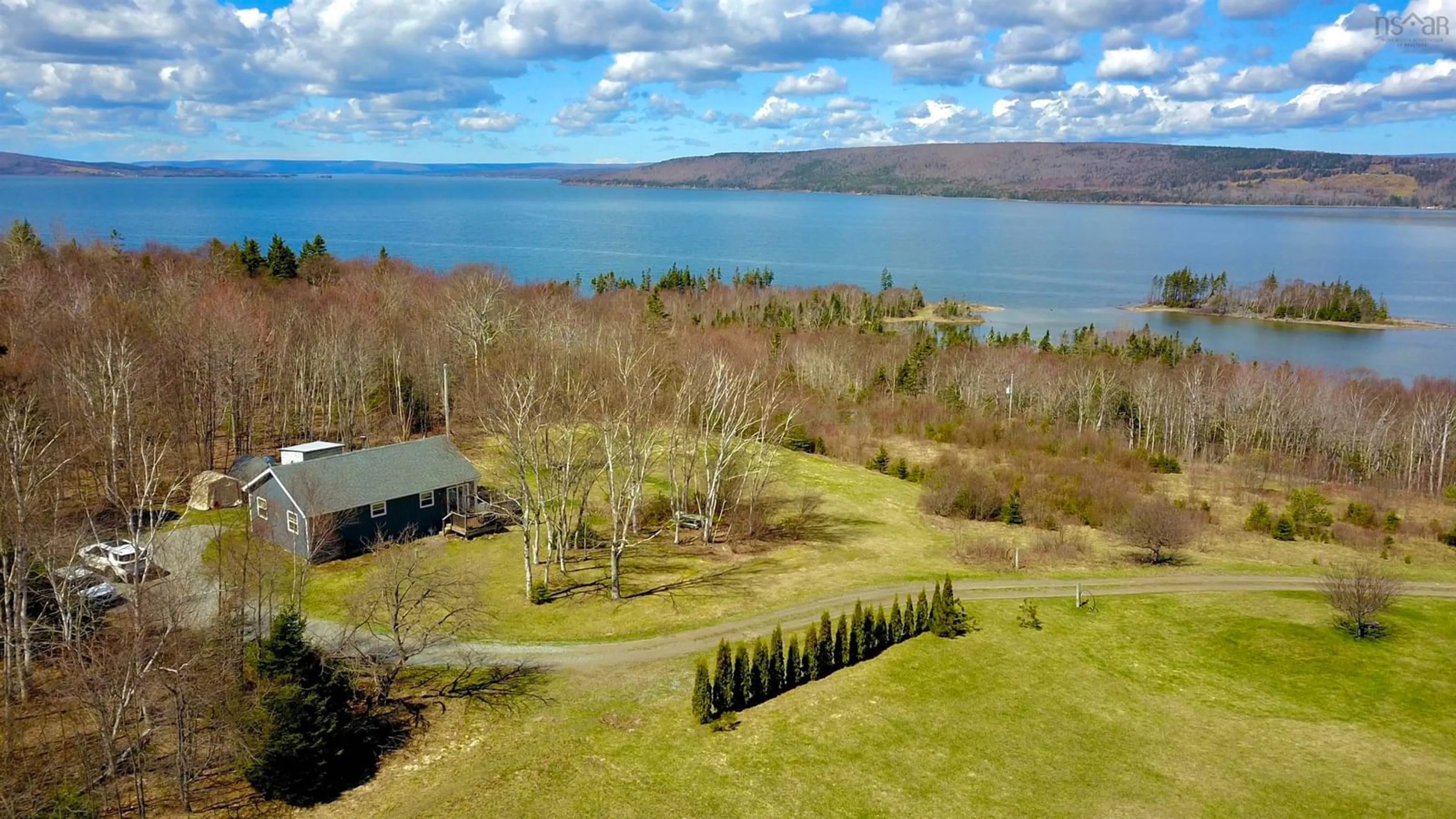 A pic from outside/outdoor area/front of a property/back of a property/a pic from drone, water/lake/river/ocean view for 8212 Kempt Head Rd, Kempt Head Nova Scotia B1X 1R8