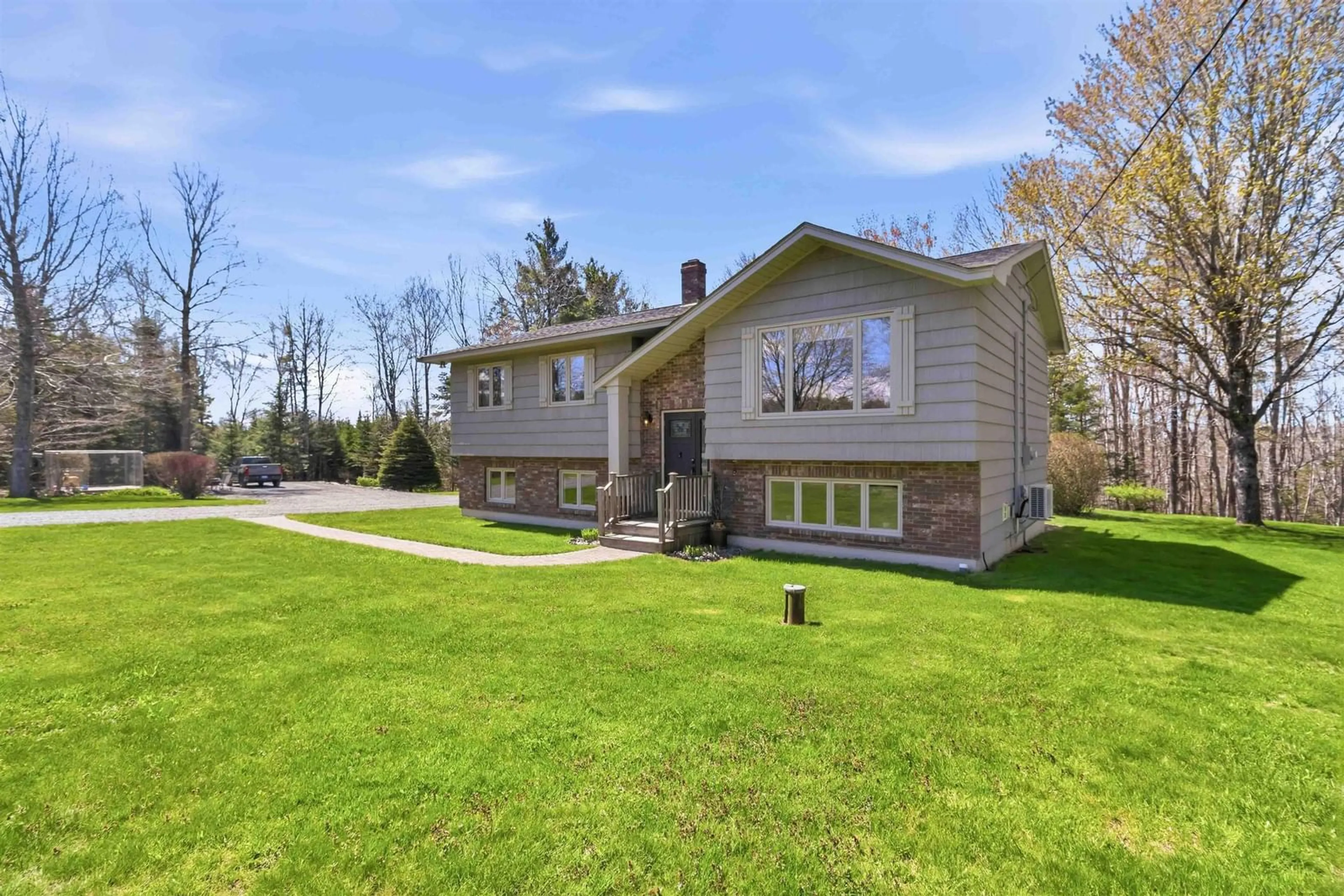 Home with vinyl exterior material, street for 61 Charles Hill Rd, Farmington Nova Scotia B0R 1A0