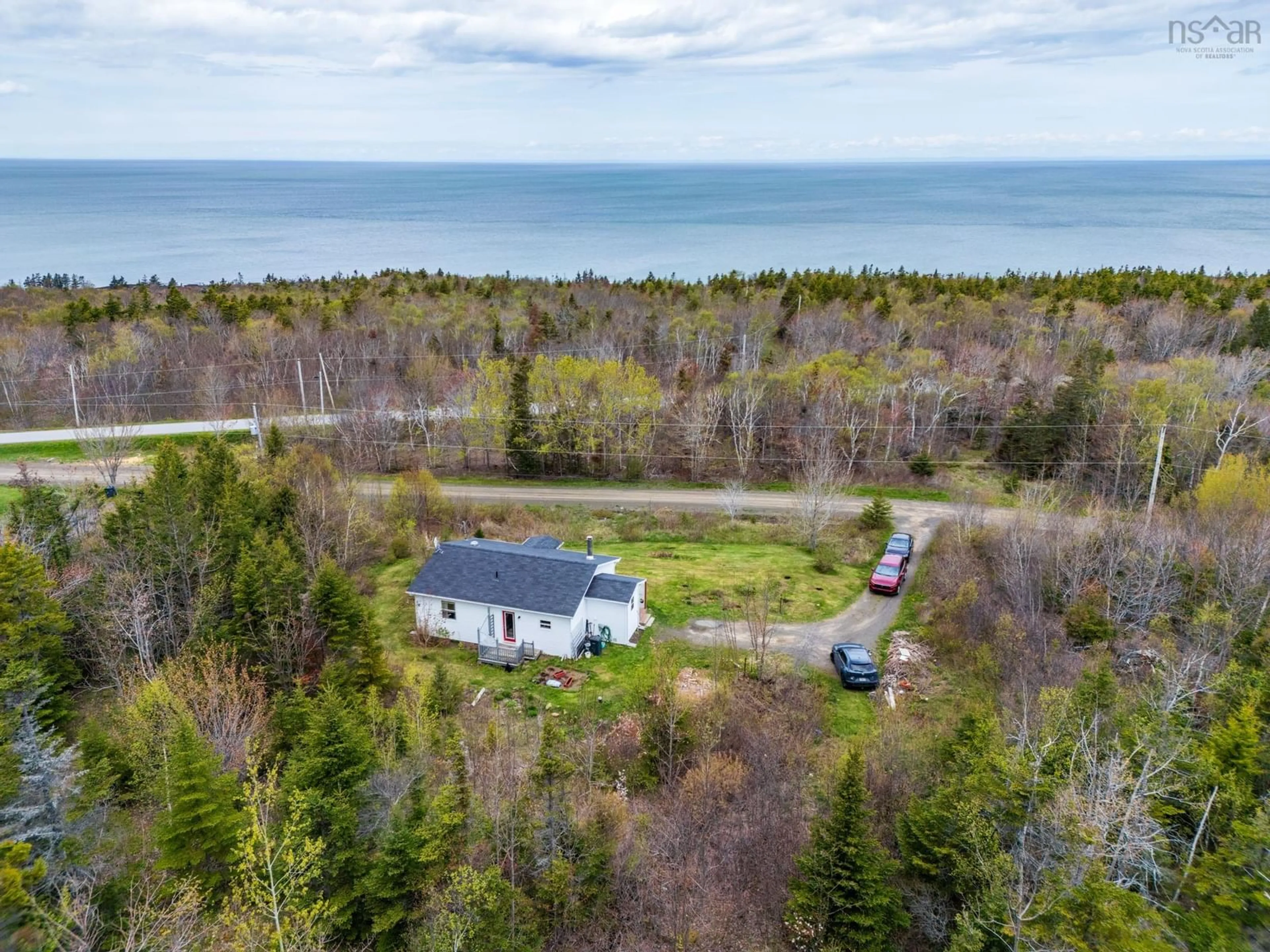 A pic from outside/outdoor area/front of a property/back of a property/a pic from drone, water/lake/river/ocean view for 28 Longley Mountain Rd, Youngs Cove Nova Scotia B0S 1L0