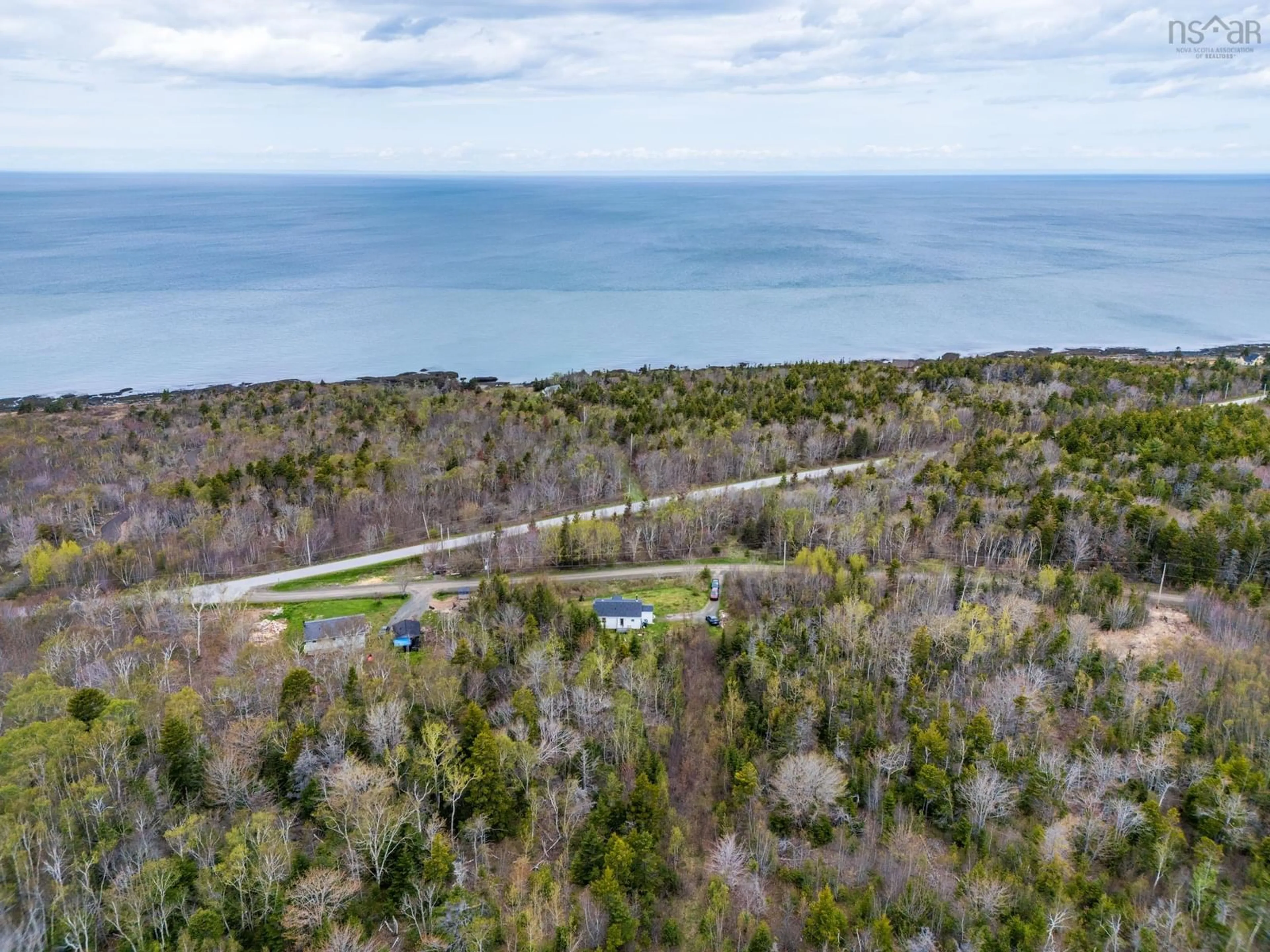 A pic from outside/outdoor area/front of a property/back of a property/a pic from drone, water/lake/river/ocean view for 28 Longley Mountain Rd, Youngs Cove Nova Scotia B0S 1L0
