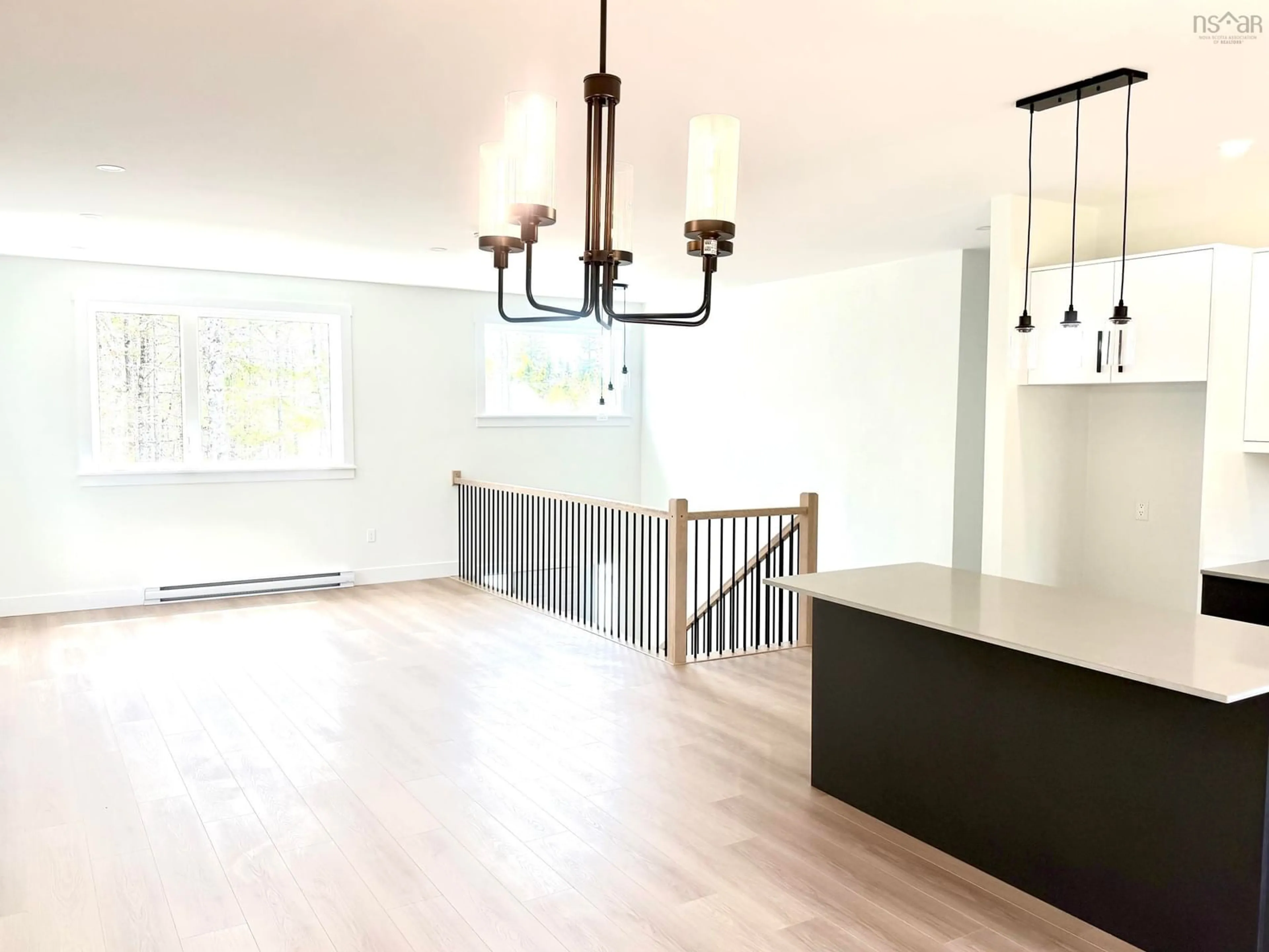 Open concept kitchen, wood/laminate floor for 32 Raihaven Lane, Whites Lake Nova Scotia B3T 1V6