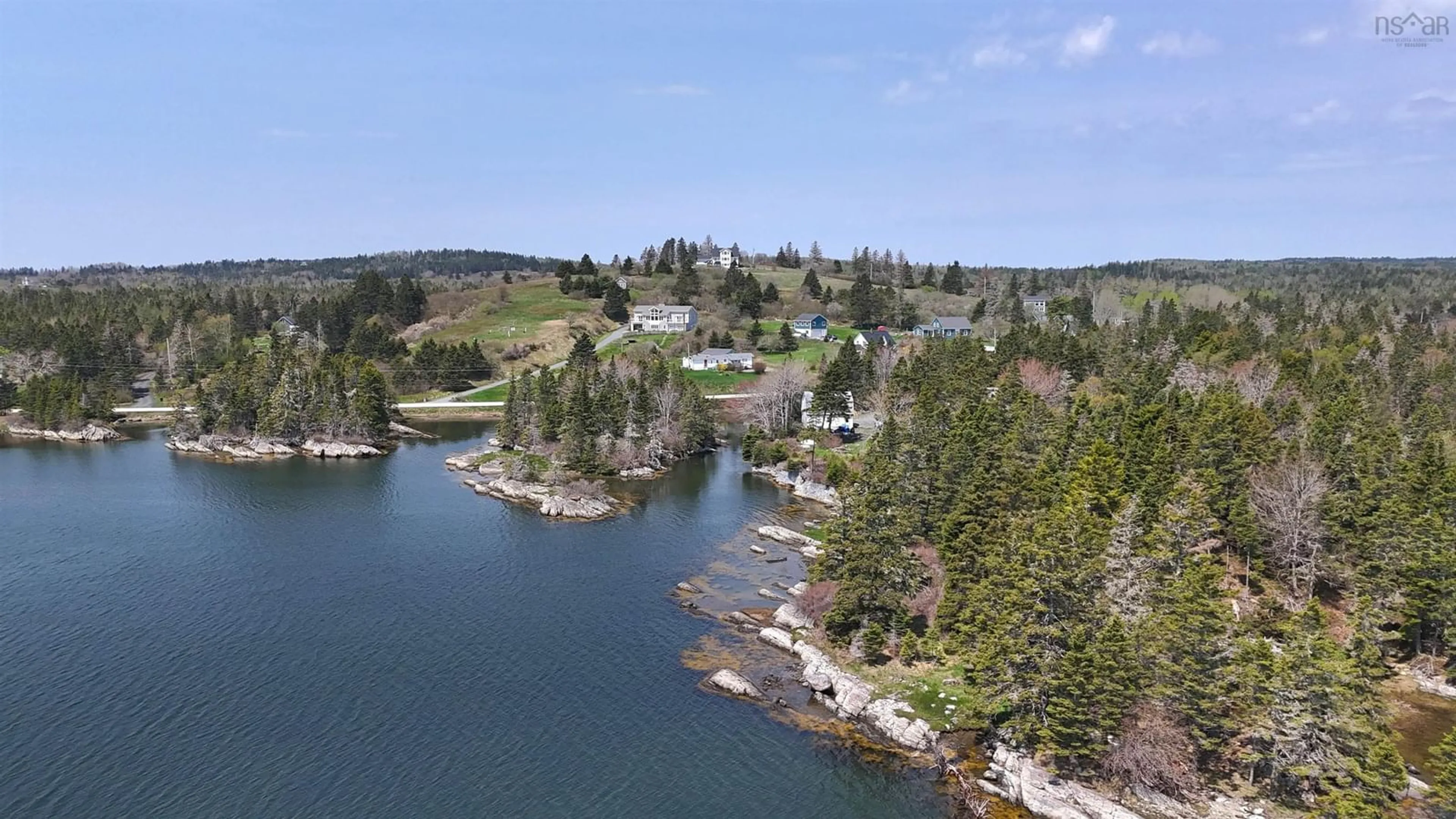 A pic from outside/outdoor area/front of a property/back of a property/a pic from drone, water/lake/river/ocean view for 28 White Ash Lane, Crescent Beach Nova Scotia B0R 1C0