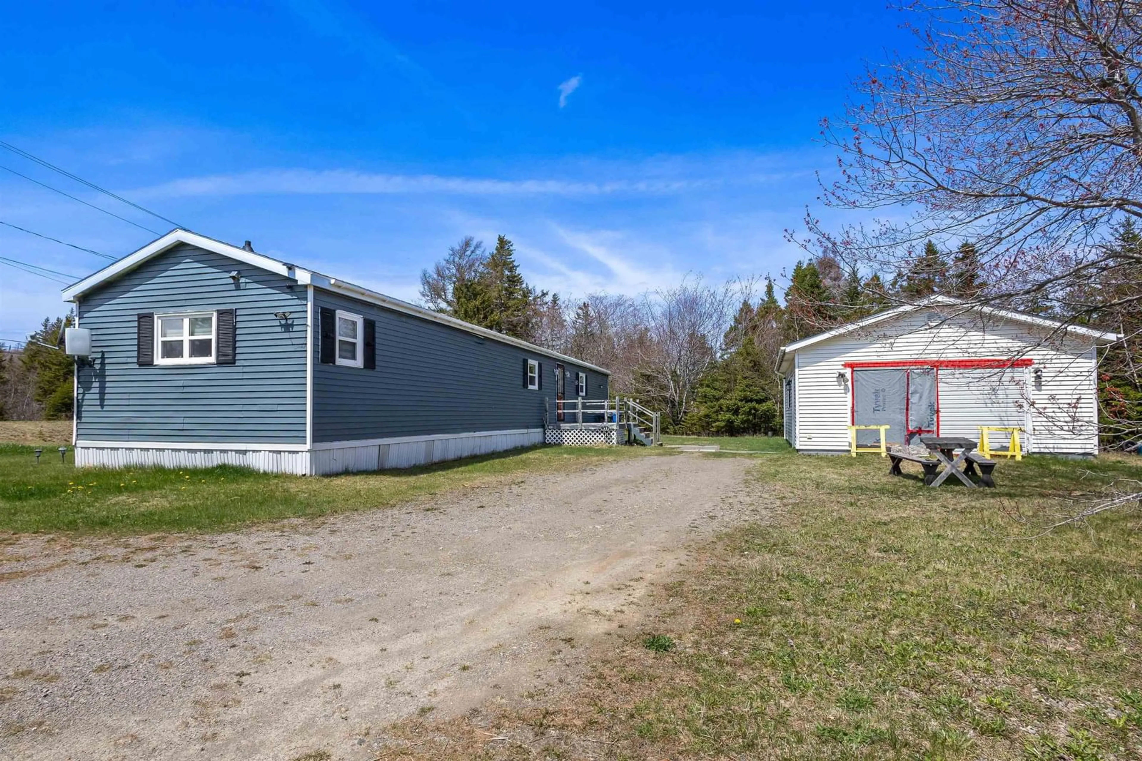 A pic from outside/outdoor area/front of a property/back of a property/a pic from drone, street for 4603 Gabarus Hwy, Big Ridge Nova Scotia B1K 1Y1