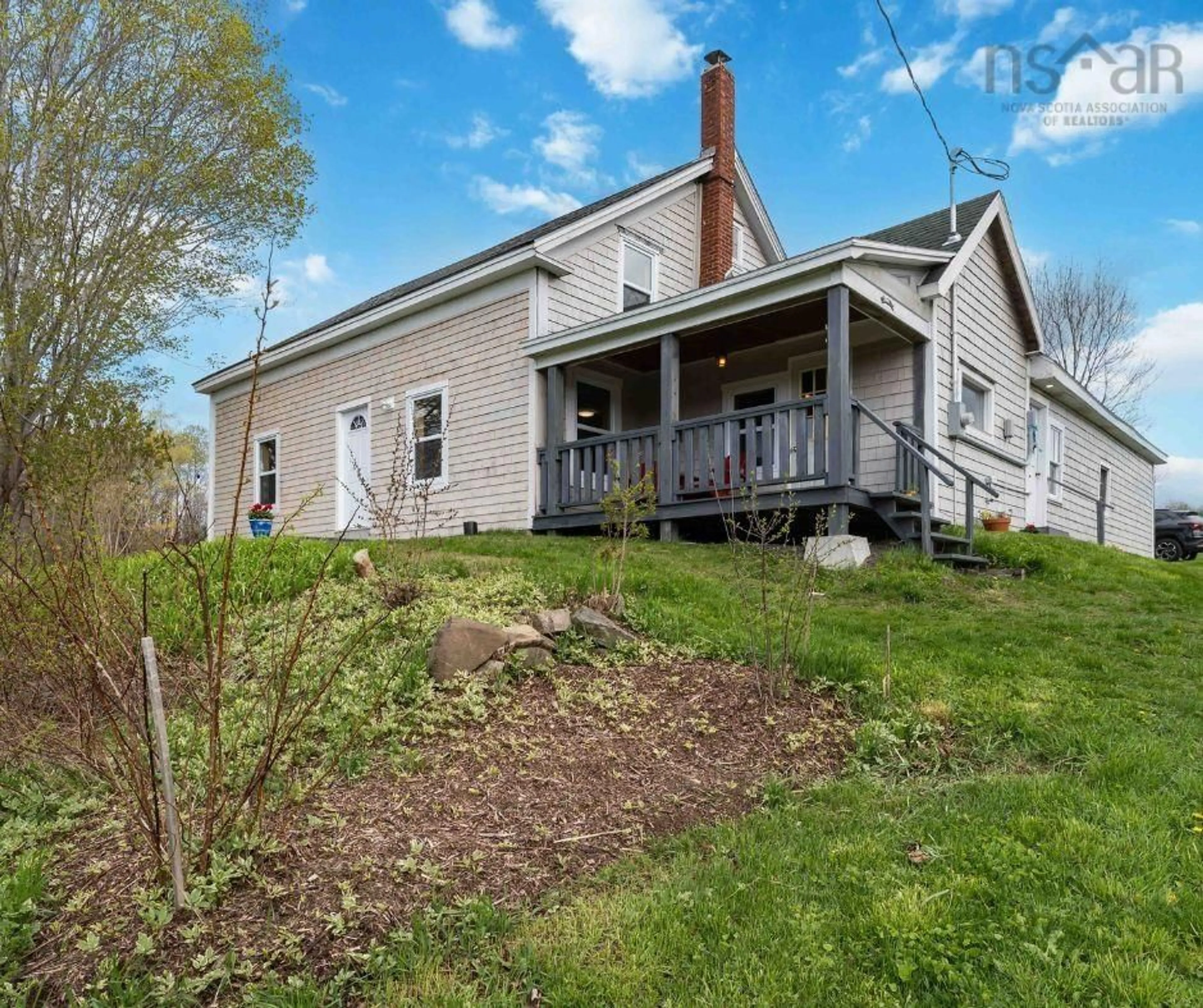 A pic from outside/outdoor area/front of a property/back of a property/a pic from drone, street for Clementsvale Rd #2578, Bear River East Nova Scotia B0S 1B0