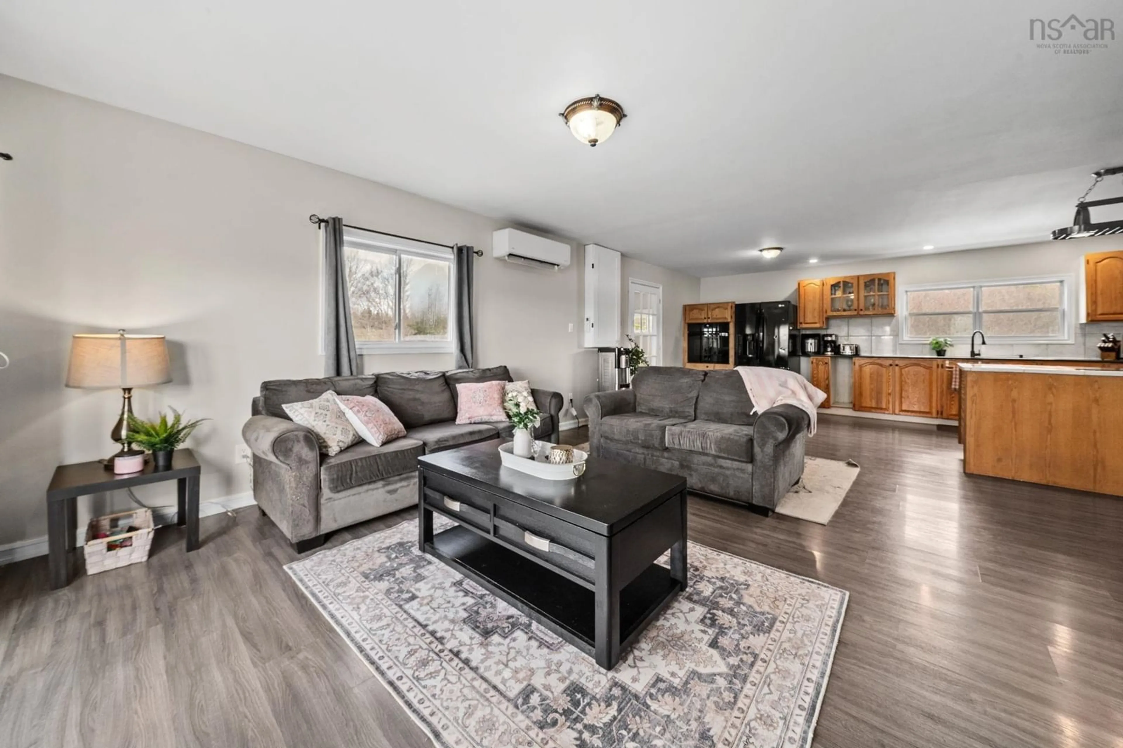 Living room with furniture, wood/laminate floor for 1517 Indian Rd, Shubenacadie Nova Scotia B0N 2H0