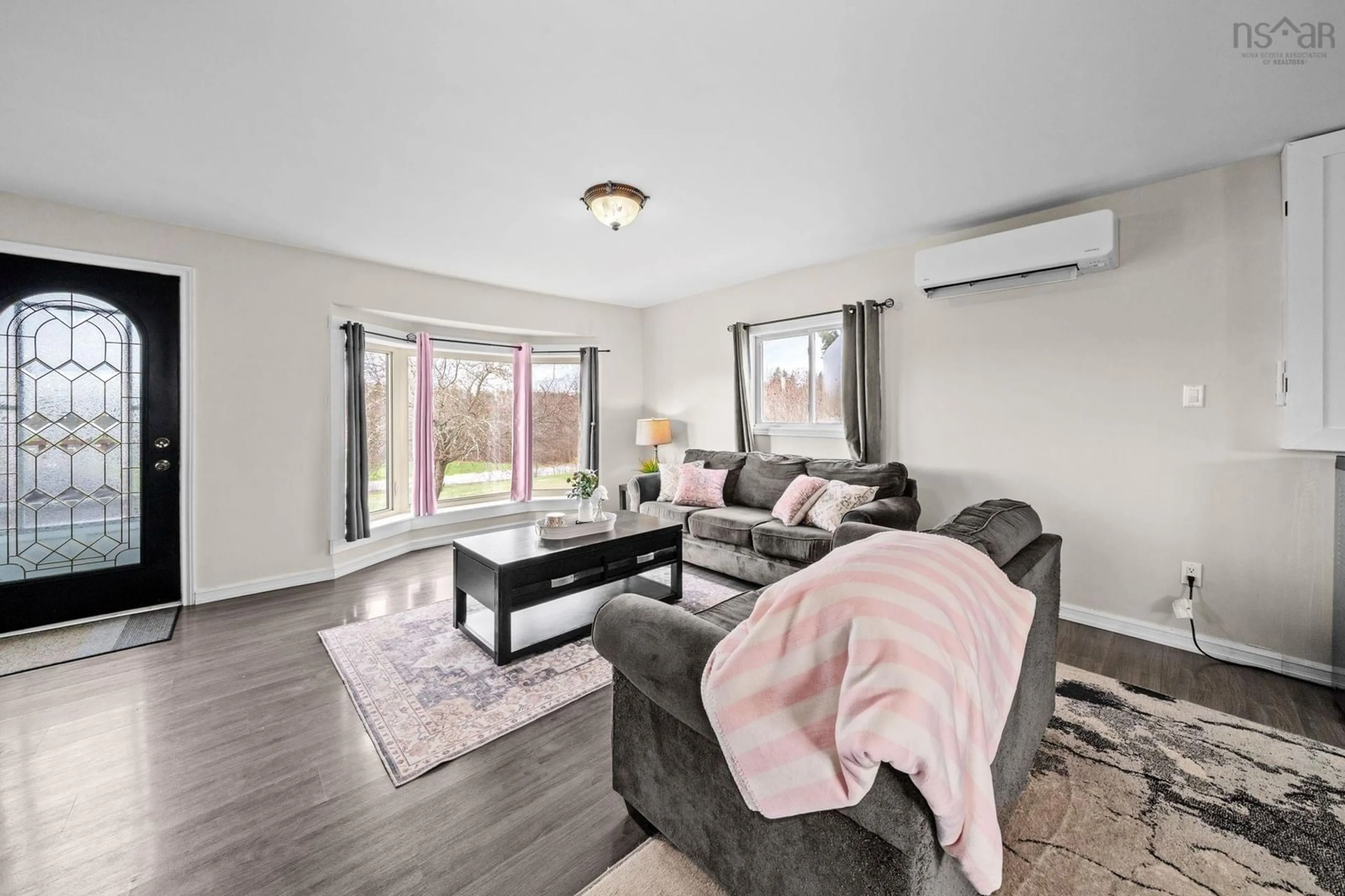 Living room with furniture, wood/laminate floor for 1517 Indian Rd, Shubenacadie Nova Scotia B0N 2H0