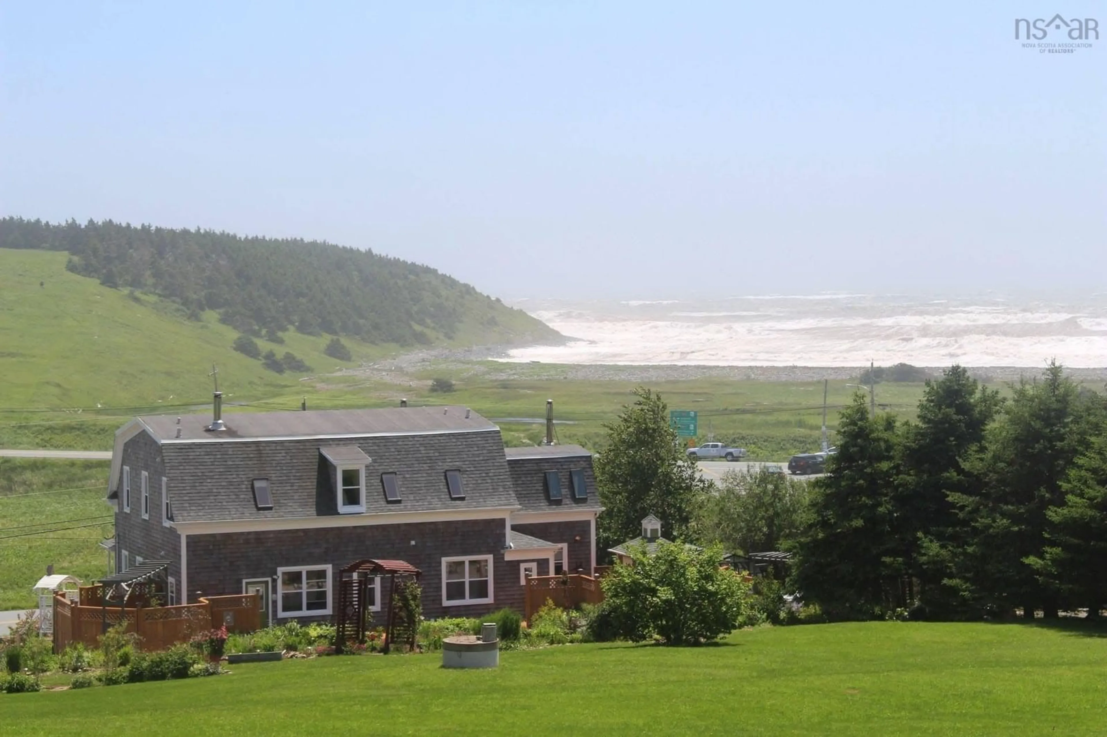 A pic from outside/outdoor area/front of a property/back of a property/a pic from drone, water/lake/river/ocean view for 2629 Crowell Rd, East Lawrencetown Nova Scotia B2Z 1P4