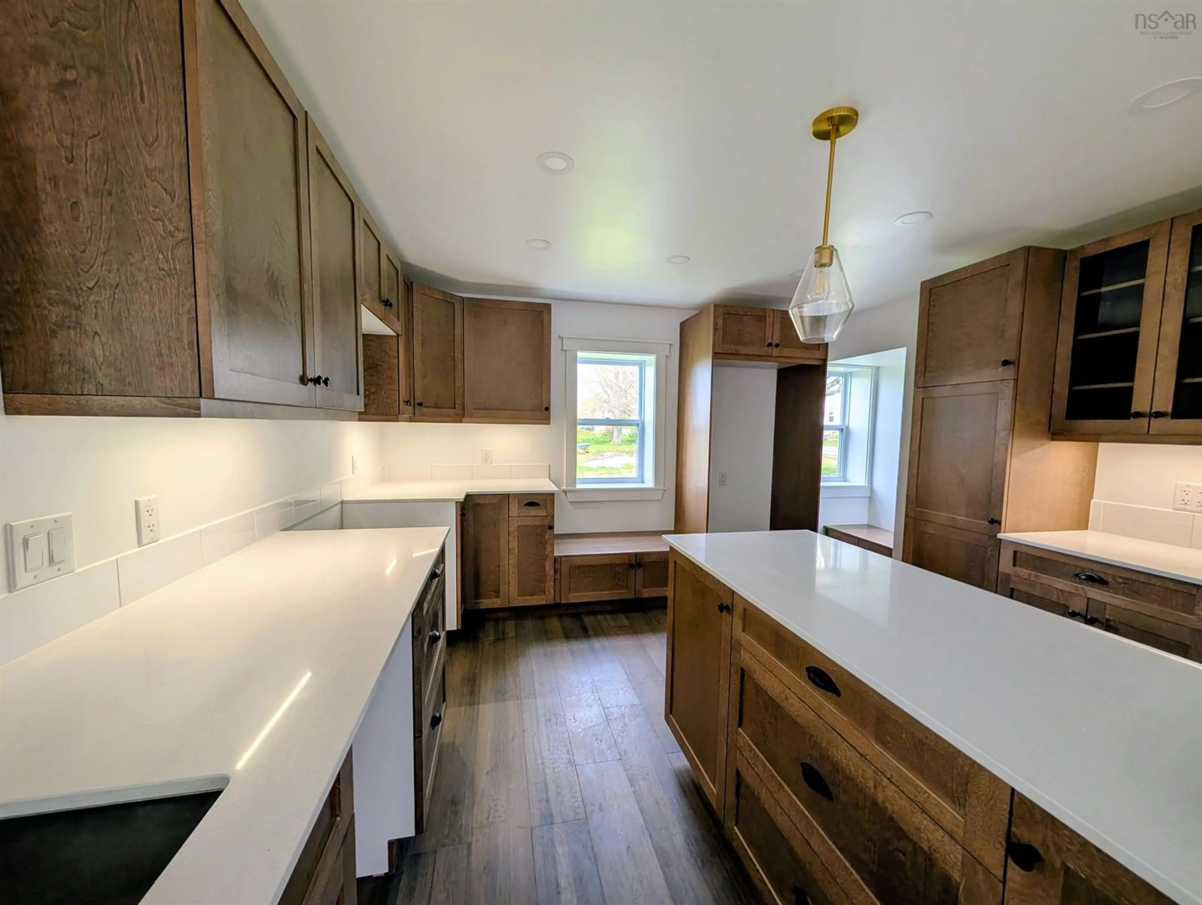 Open concept kitchen, wood/laminate floor for 8836 Hwy 2 Hwy, Great Village Nova Scotia B0M 1L0