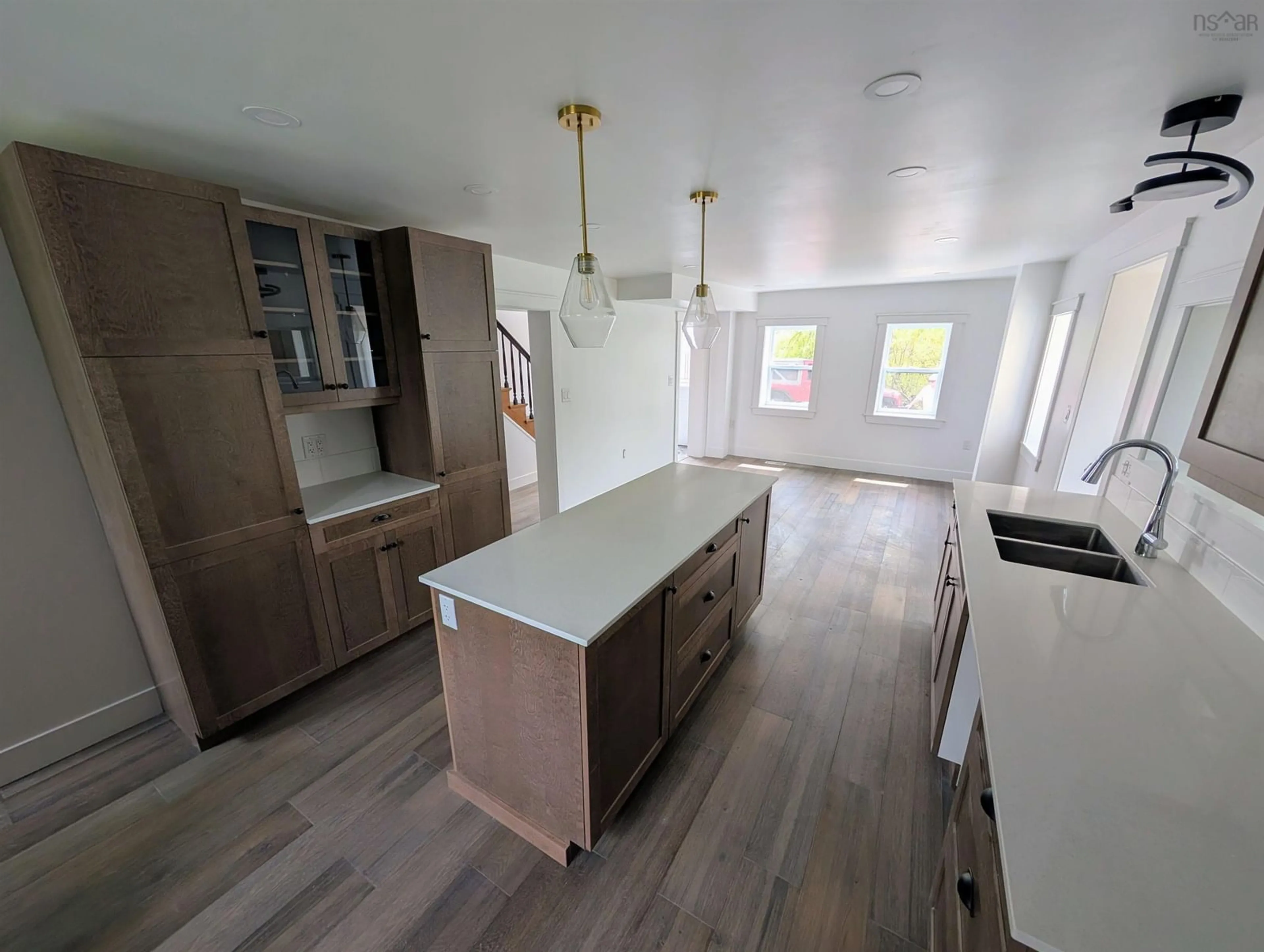 Open concept kitchen, wood/laminate floor for 8836 Hwy 2 Hwy, Great Village Nova Scotia B0M 1L0