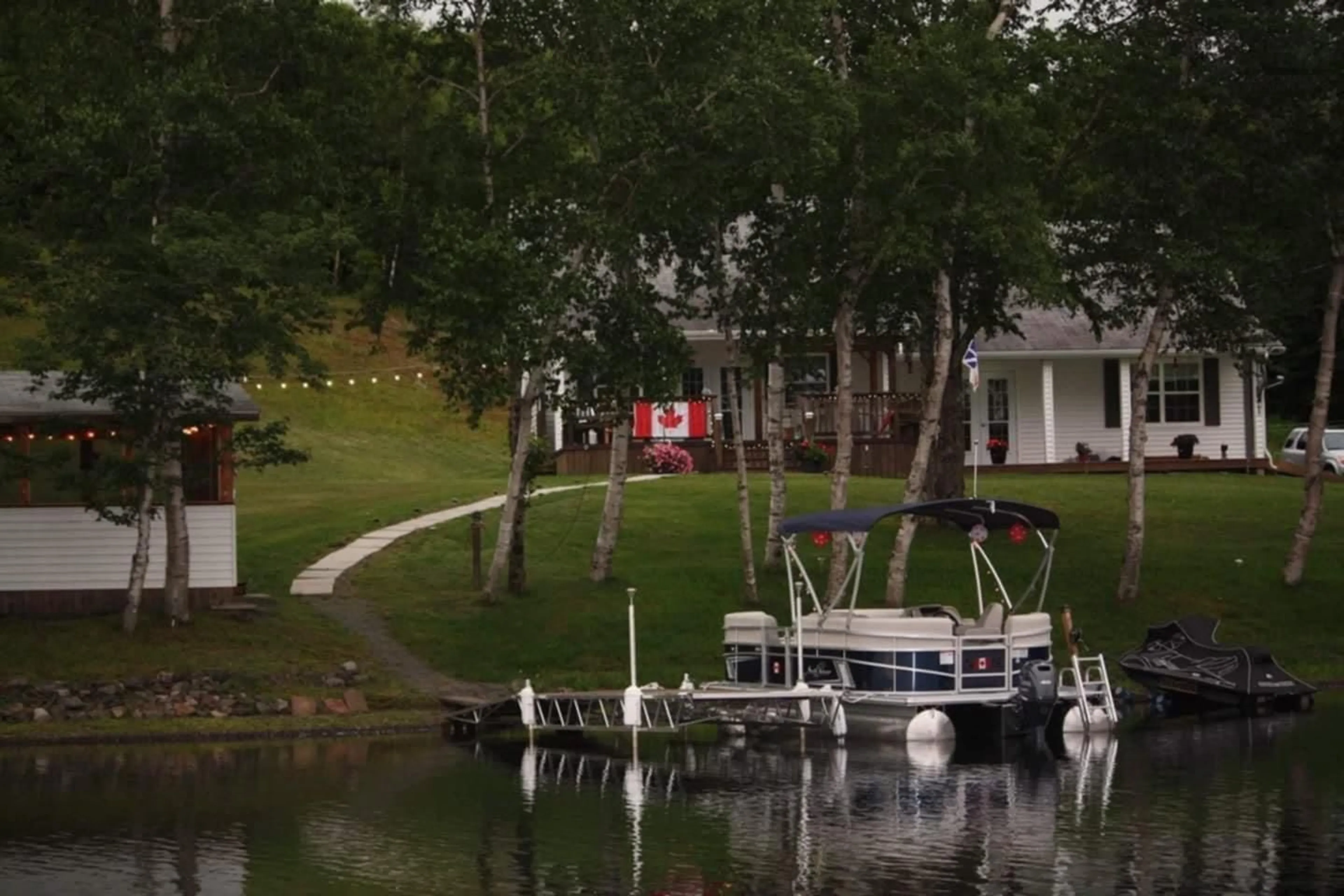 A pic from outside/outdoor area/front of a property/back of a property/a pic from drone, water/lake/river/ocean view for 102 Penny Lane, Arichat Nova Scotia B0H 1M0