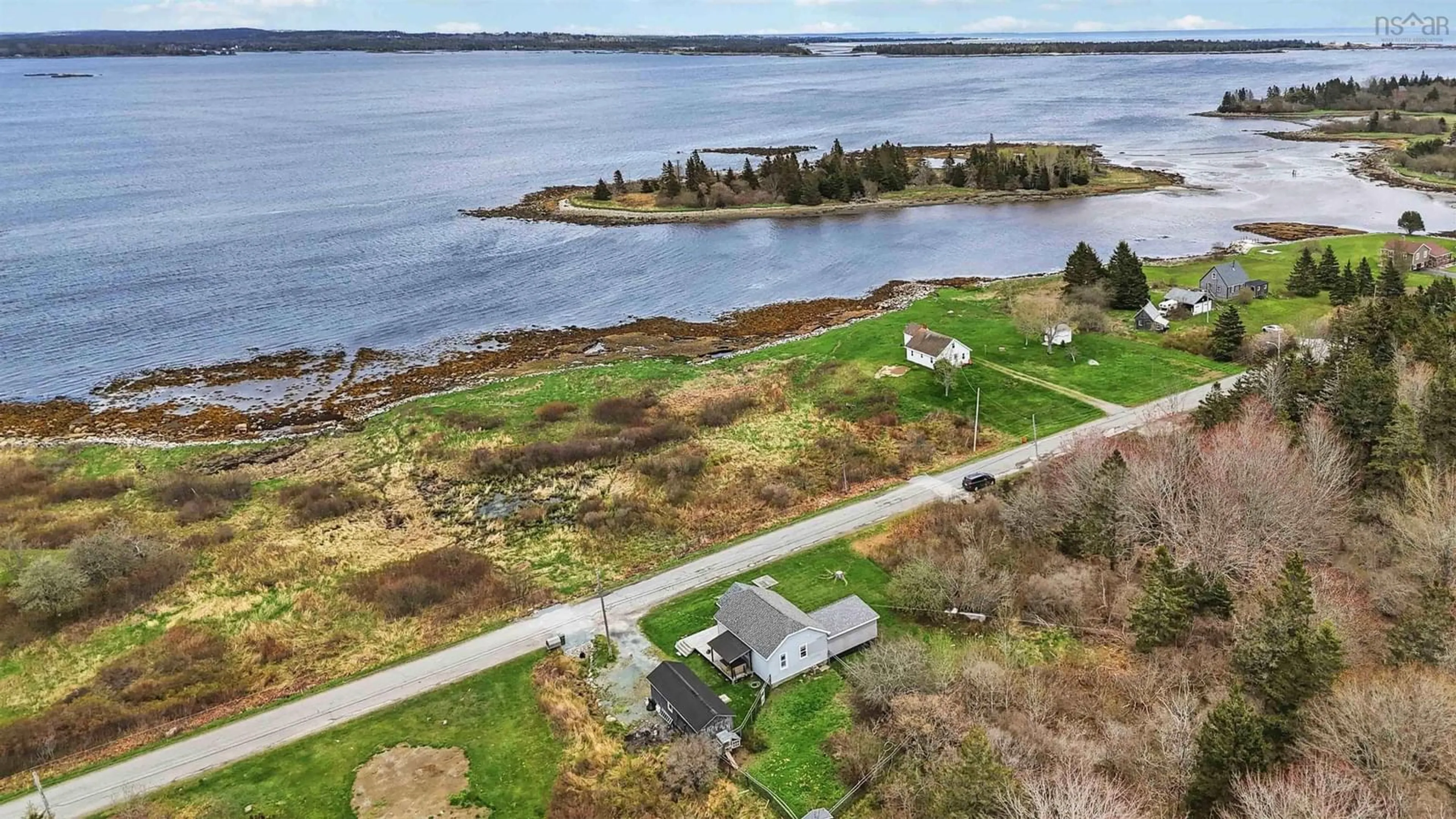 A pic from outside/outdoor area/front of a property/back of a property/a pic from drone, water/lake/river/ocean view for 216 Long Cove Rd, Port Medway Nova Scotia B0J 2T0