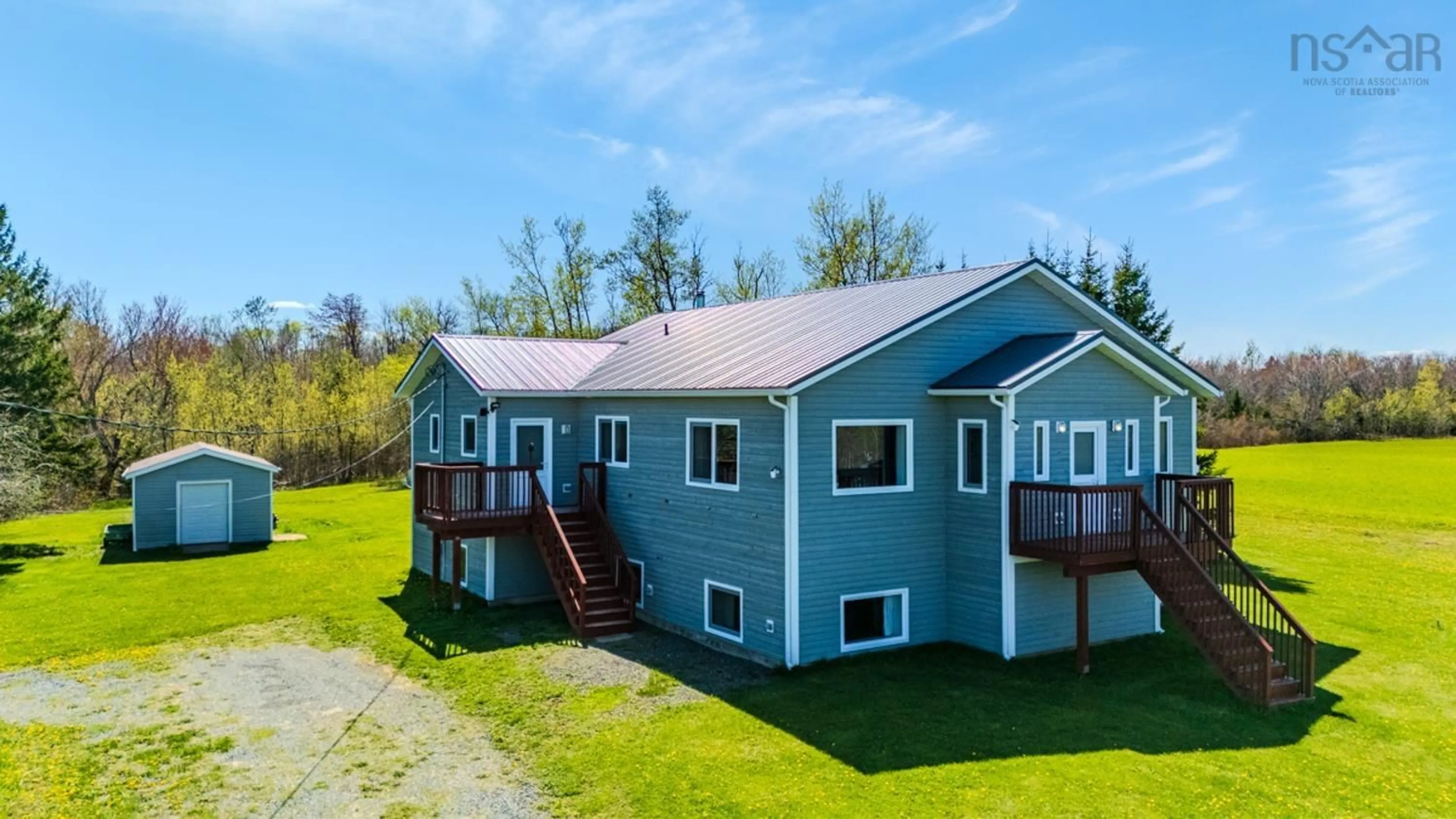A pic from outside/outdoor area/front of a property/back of a property/a pic from drone, water/lake/river/ocean view for 9118 Highway 366, Linden Nova Scotia B0K 1K0