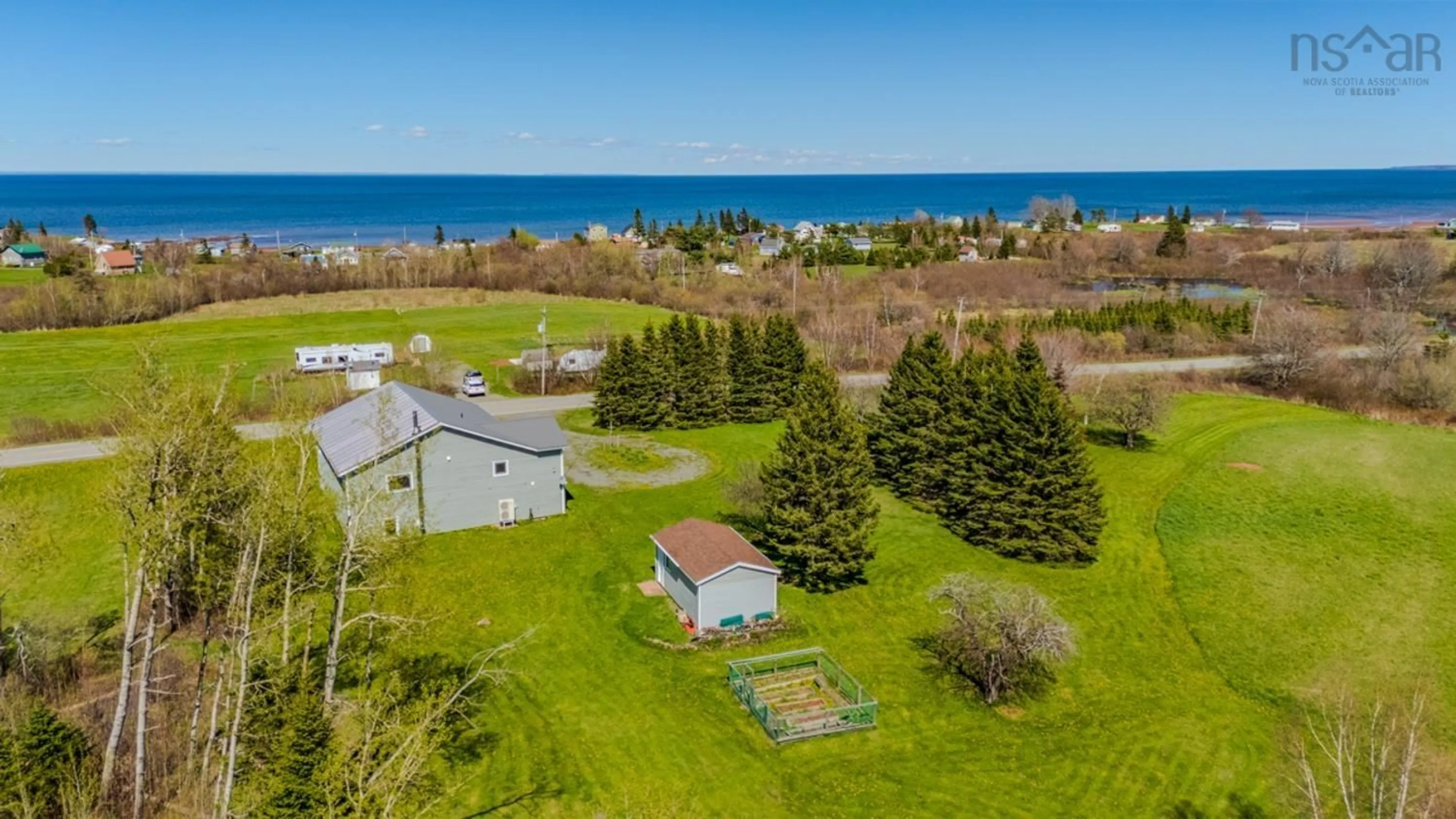 A pic from outside/outdoor area/front of a property/back of a property/a pic from drone, water/lake/river/ocean view for 9118 Highway 366, Linden Nova Scotia B0K 1K0