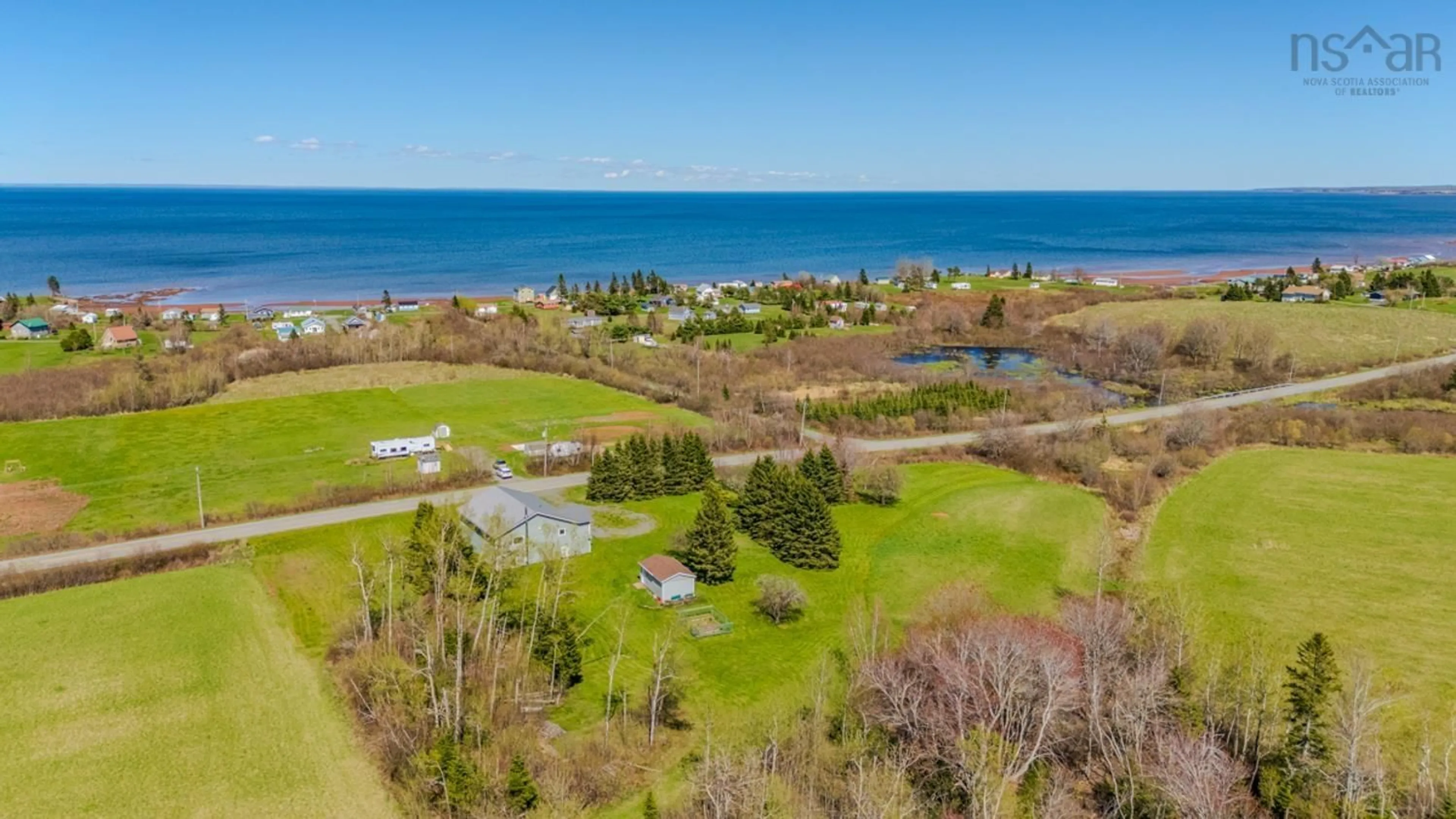 A pic from outside/outdoor area/front of a property/back of a property/a pic from drone, water/lake/river/ocean view for 9118 Highway 366, Linden Nova Scotia B0K 1K0