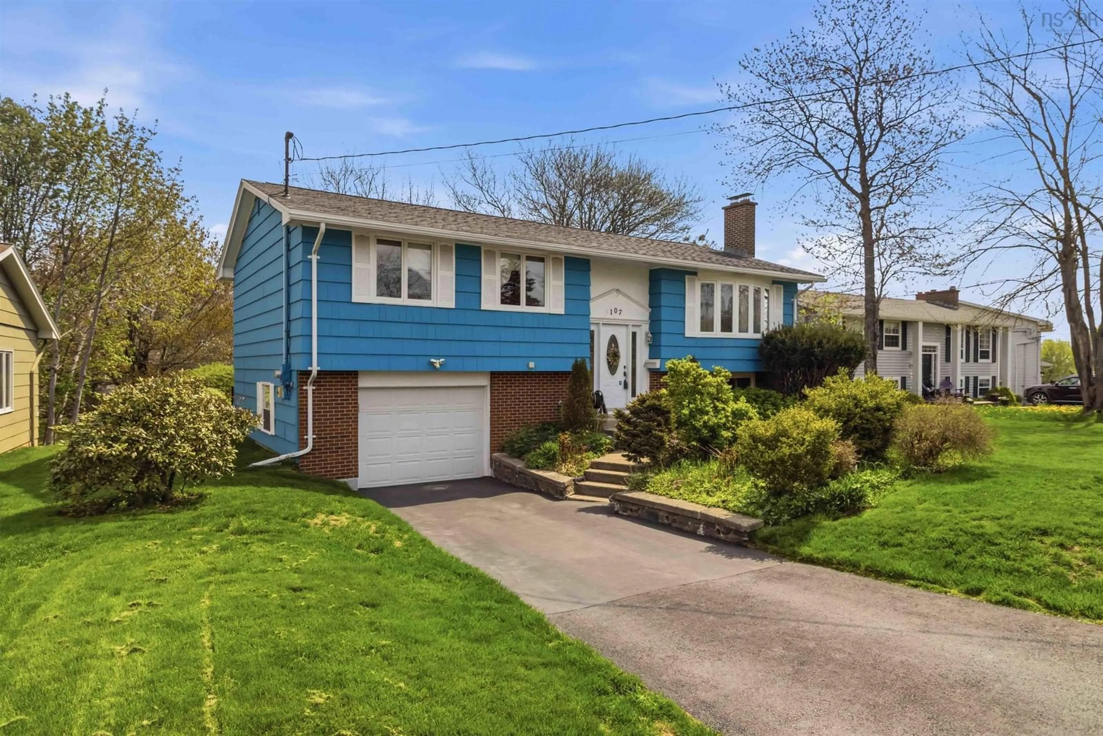 Home with vinyl exterior material, street for 107 Flamingo Dr, Rockingham Nova Scotia B3M 1T2