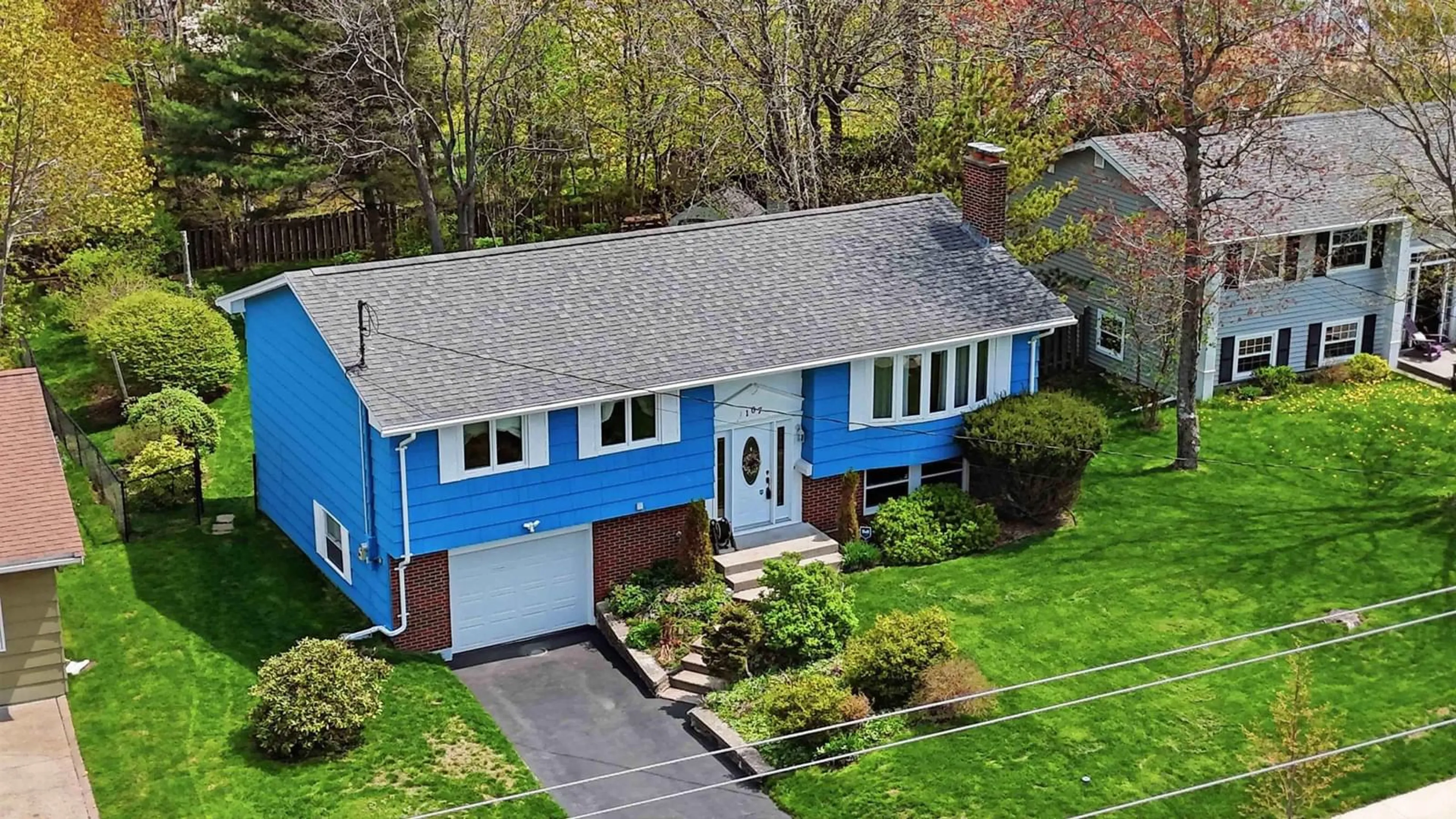 A pic from outside/outdoor area/front of a property/back of a property/a pic from drone, street for 107 Flamingo Dr, Rockingham Nova Scotia B3M 1T2