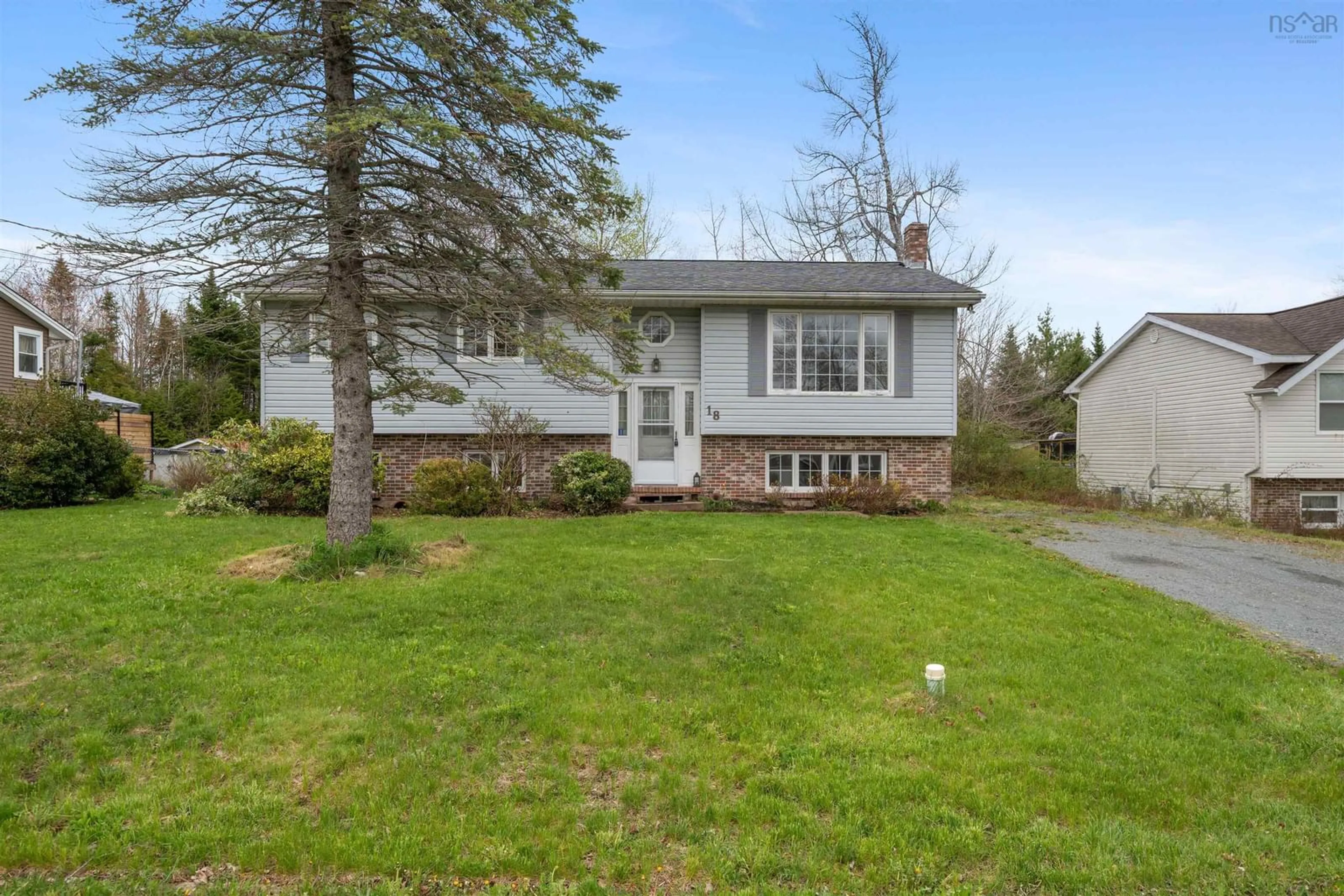Home with vinyl exterior material, street for 18 Tannery Dr, Elmsdale Nova Scotia B2S 1C8