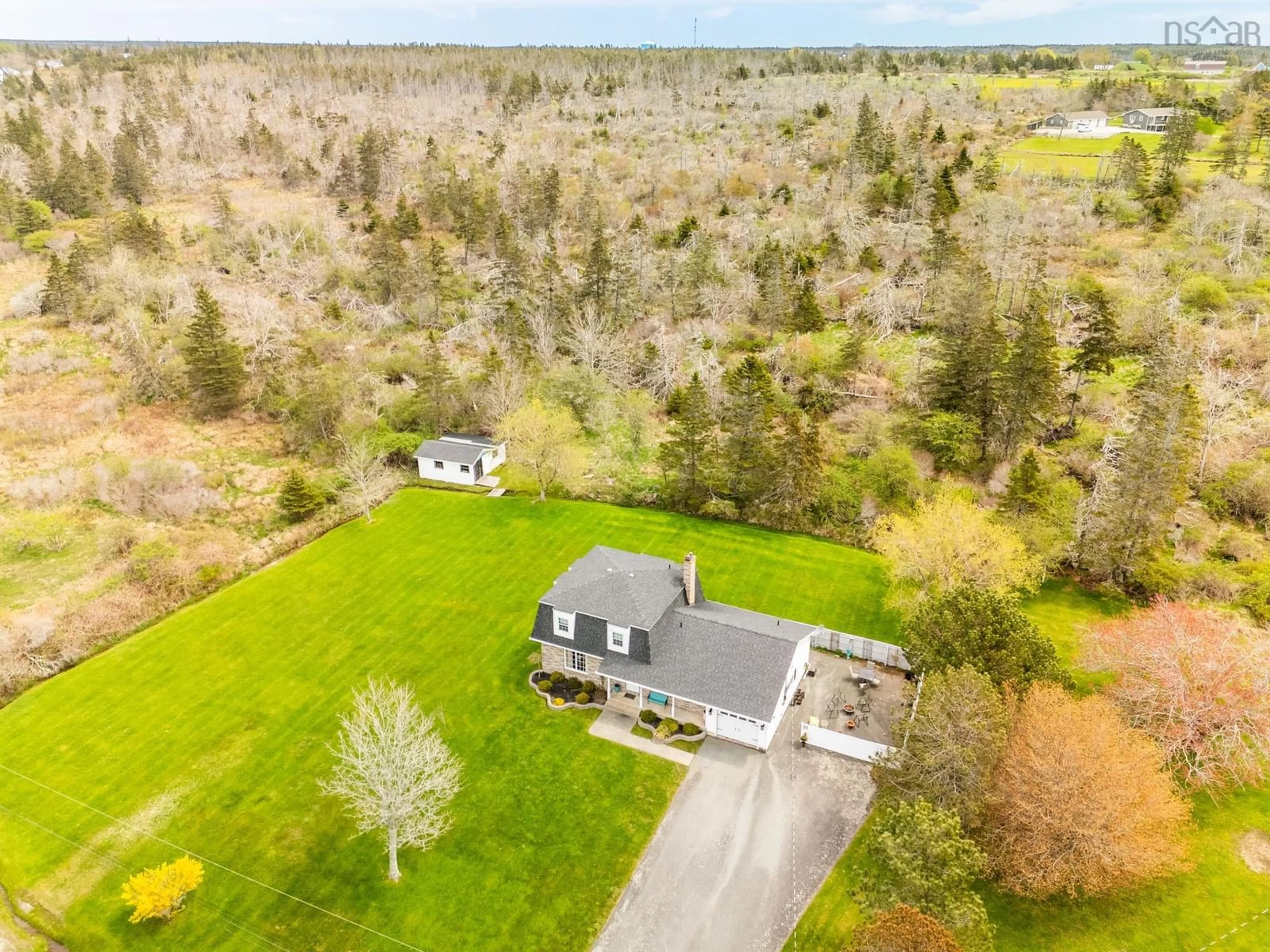 A pic from outside/outdoor area/front of a property/back of a property/a pic from drone, water/lake/river/ocean view for 19 Goodwin Dr, Dayton Nova Scotia B5A 4H7