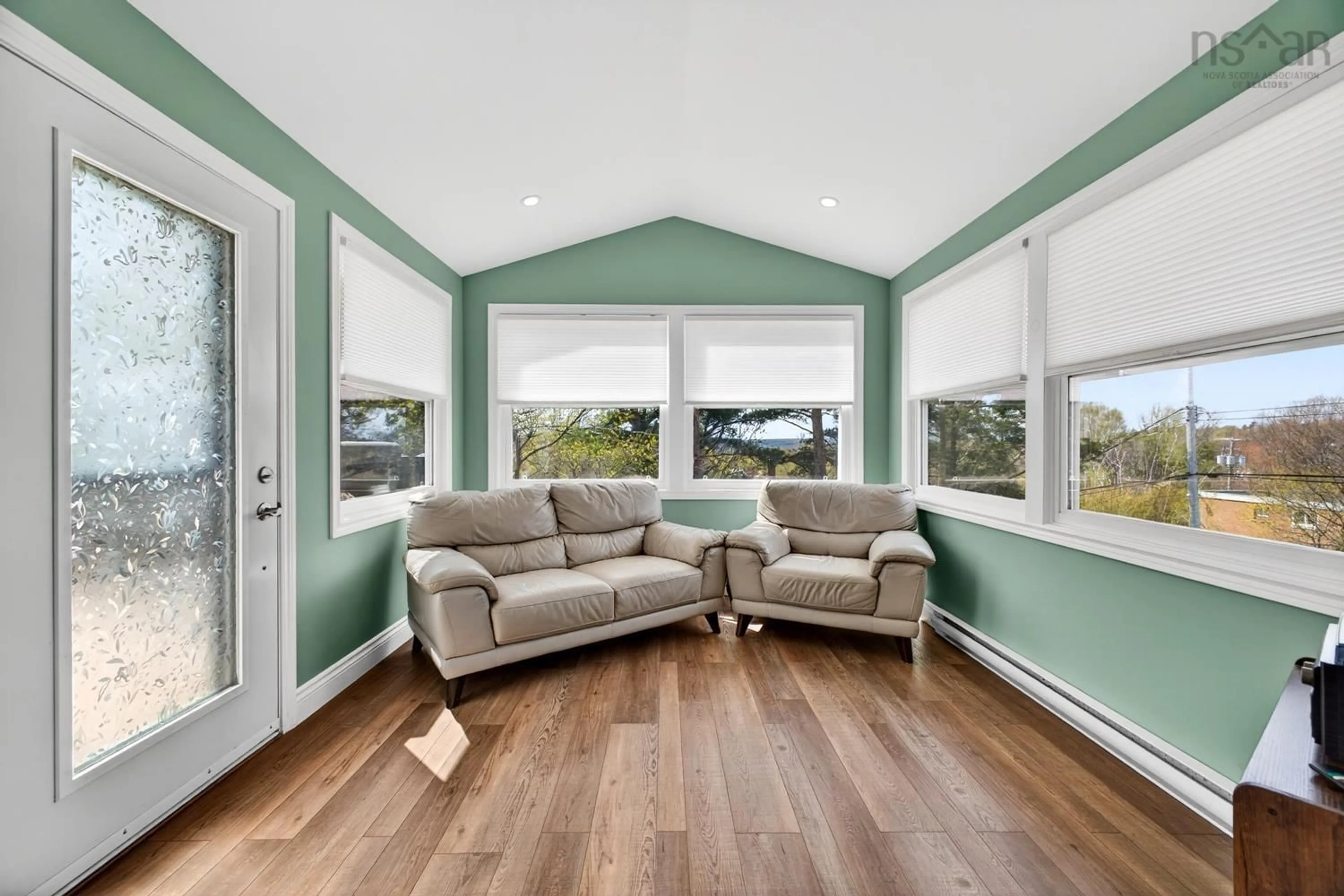 Living room with furniture, wood/laminate floor for 31 Fourth St, New Glasgow Nova Scotia B2H 1C9