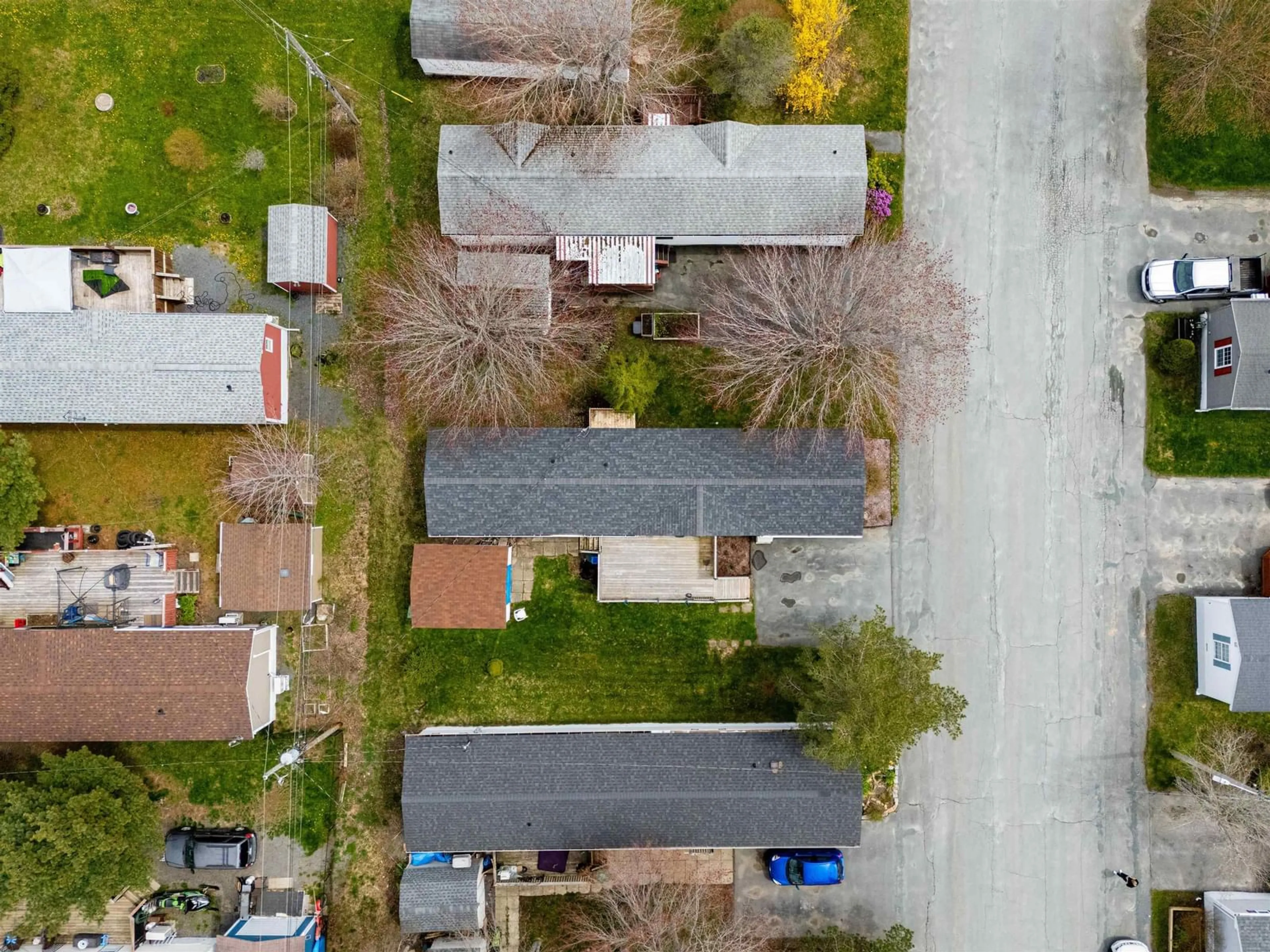 A pic from outside/outdoor area/front of a property/back of a property/a pic from drone, street for 4 Tenth St, Lucasville Nova Scotia B4B 1R6