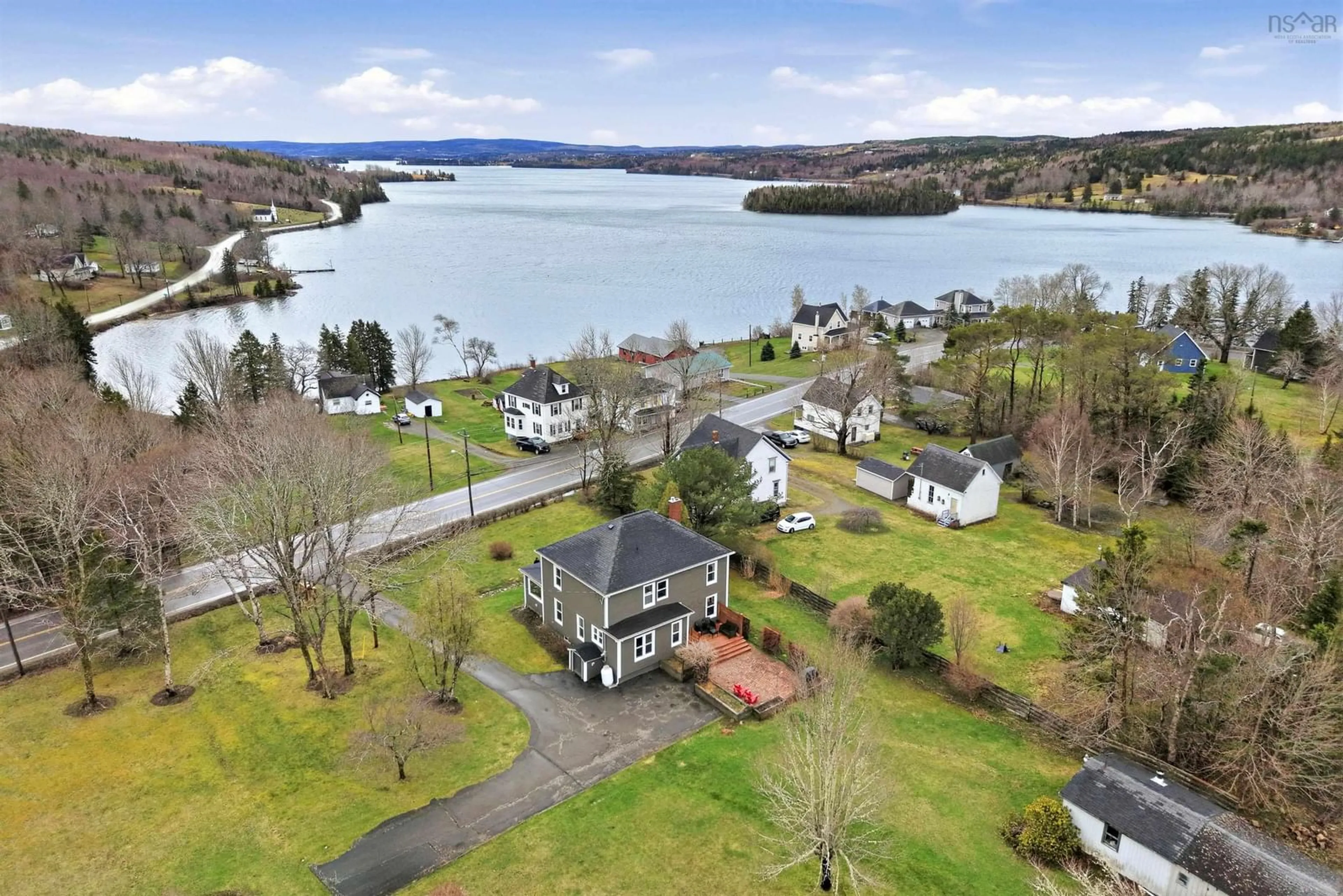 A pic from outside/outdoor area/front of a property/back of a property/a pic from drone, water/lake/river/ocean view for 11659 Highway 16, Boylston Nova Scotia B0H 1G0