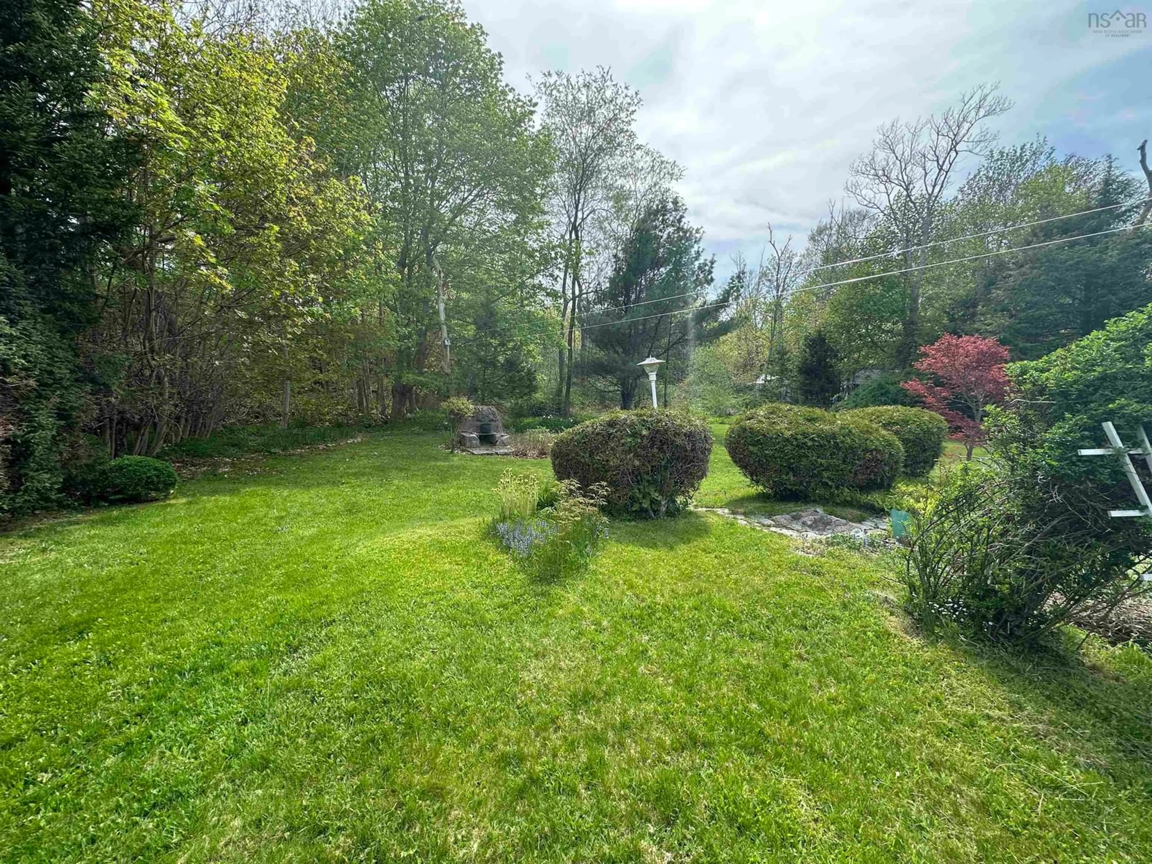 A pic from outside/outdoor area/front of a property/back of a property/a pic from drone, forest/trees view for 166 School St, Liverpool Nova Scotia B0T 1K0