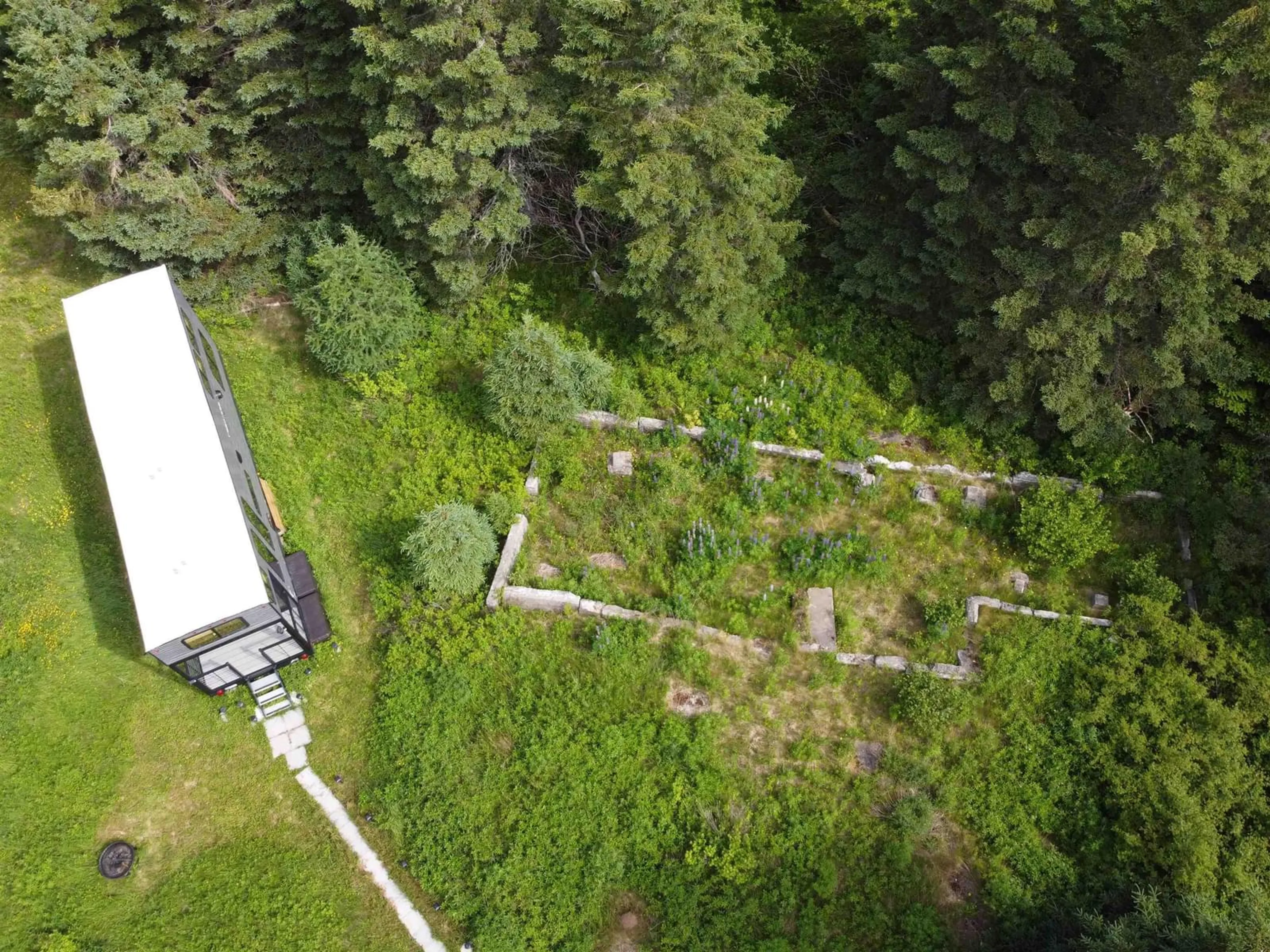 A pic from outside/outdoor area/front of a property/back of a property/a pic from drone, forest/trees view for 24 Englehutt Rd, Moser River Nova Scotia B0J 2R0