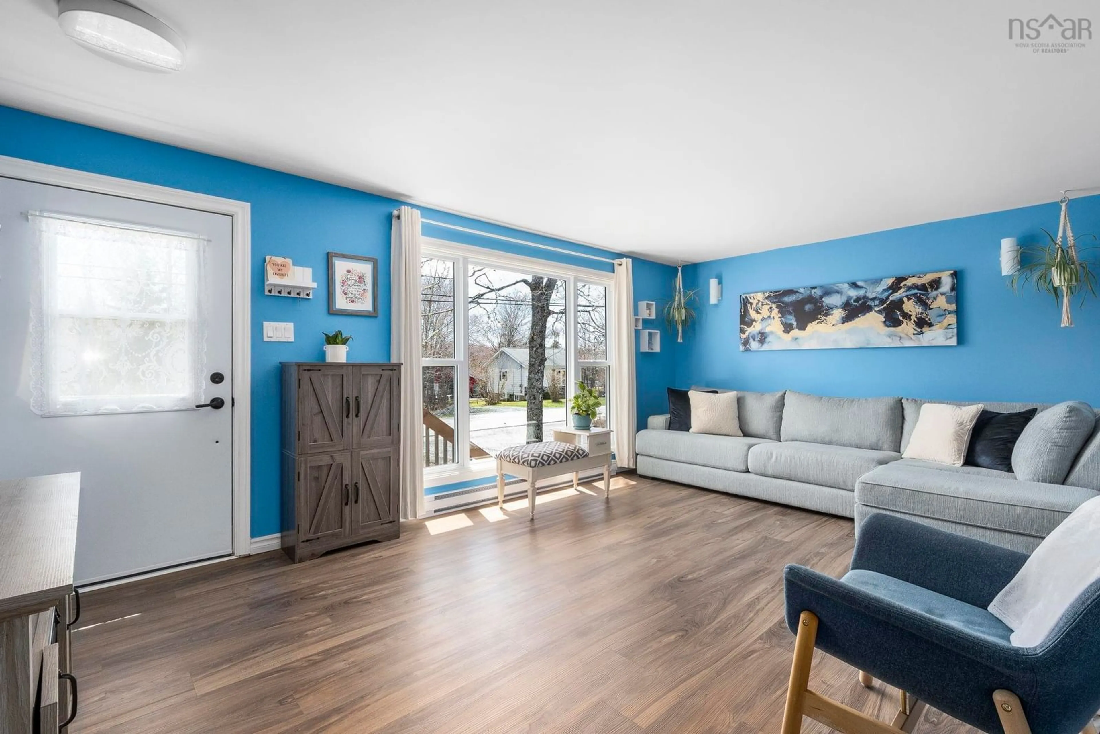 Living room with furniture, wood/laminate floor for 29 Mill Rd, Mount Uniacke Nova Scotia B0N 1Z0