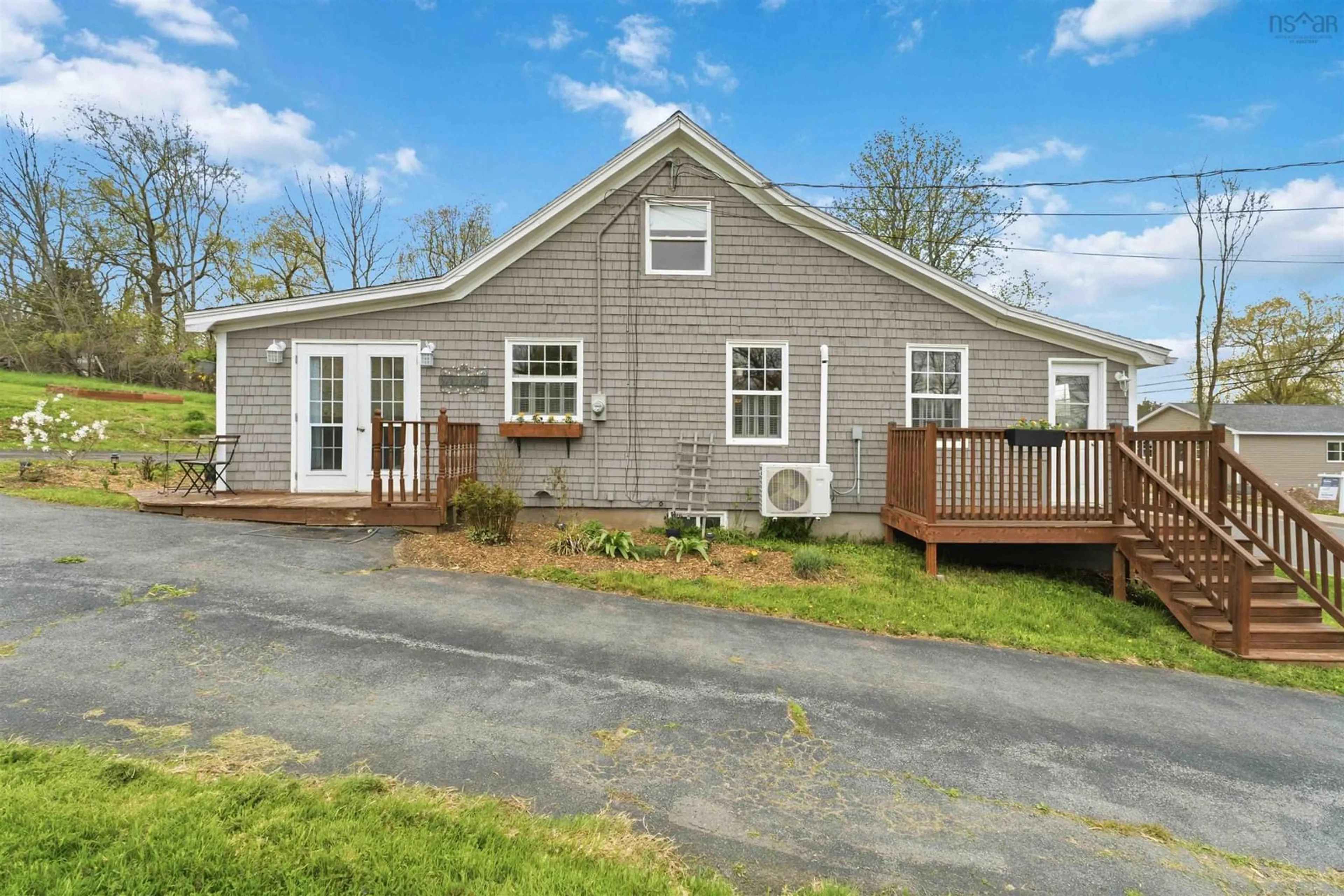 Home with vinyl exterior material, street for 25 Willow St, Hantsport Nova Scotia B0P 1P0