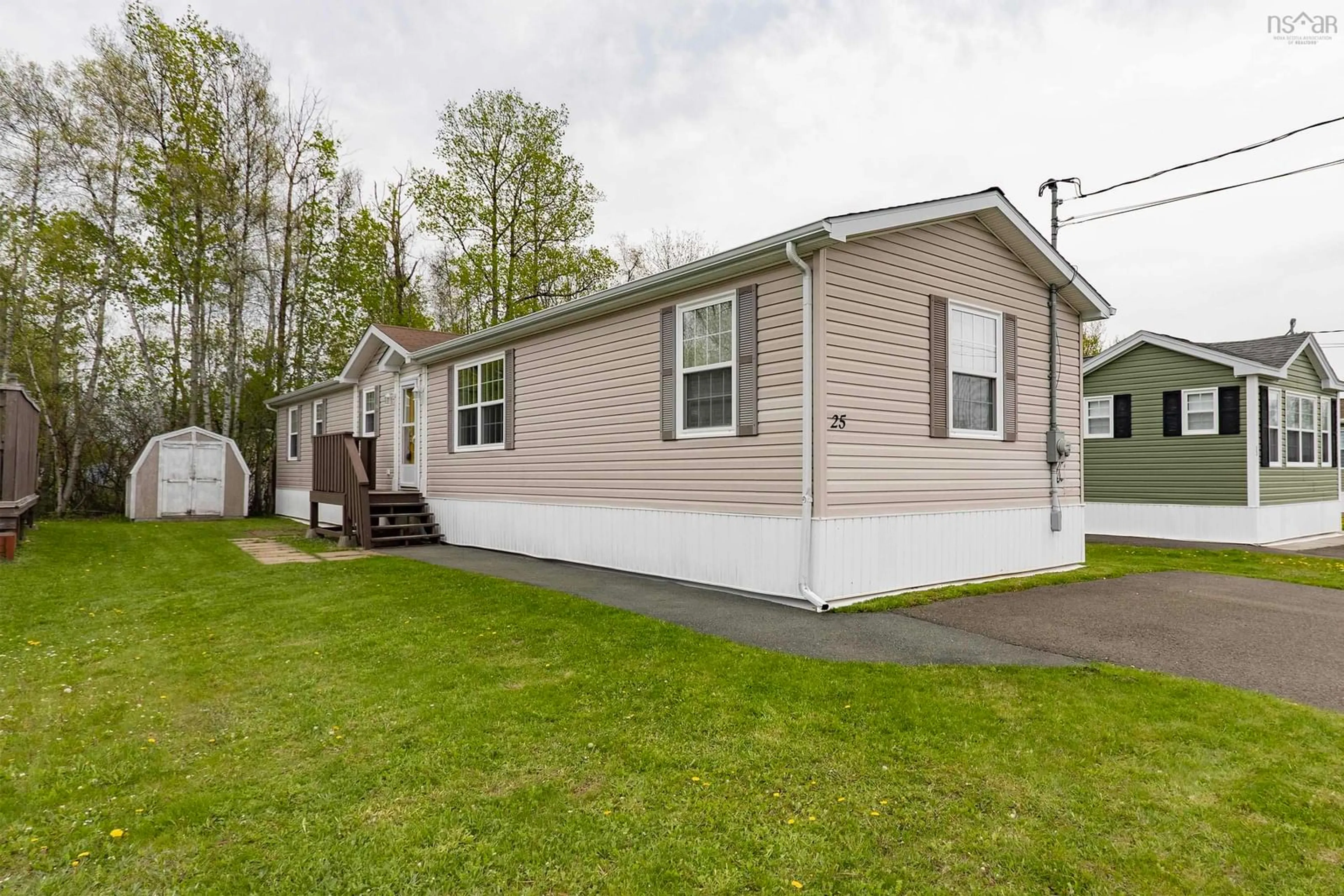Home with vinyl exterior material, street for 25 Pinehurst St, Amherst Nova Scotia B4H 4X5