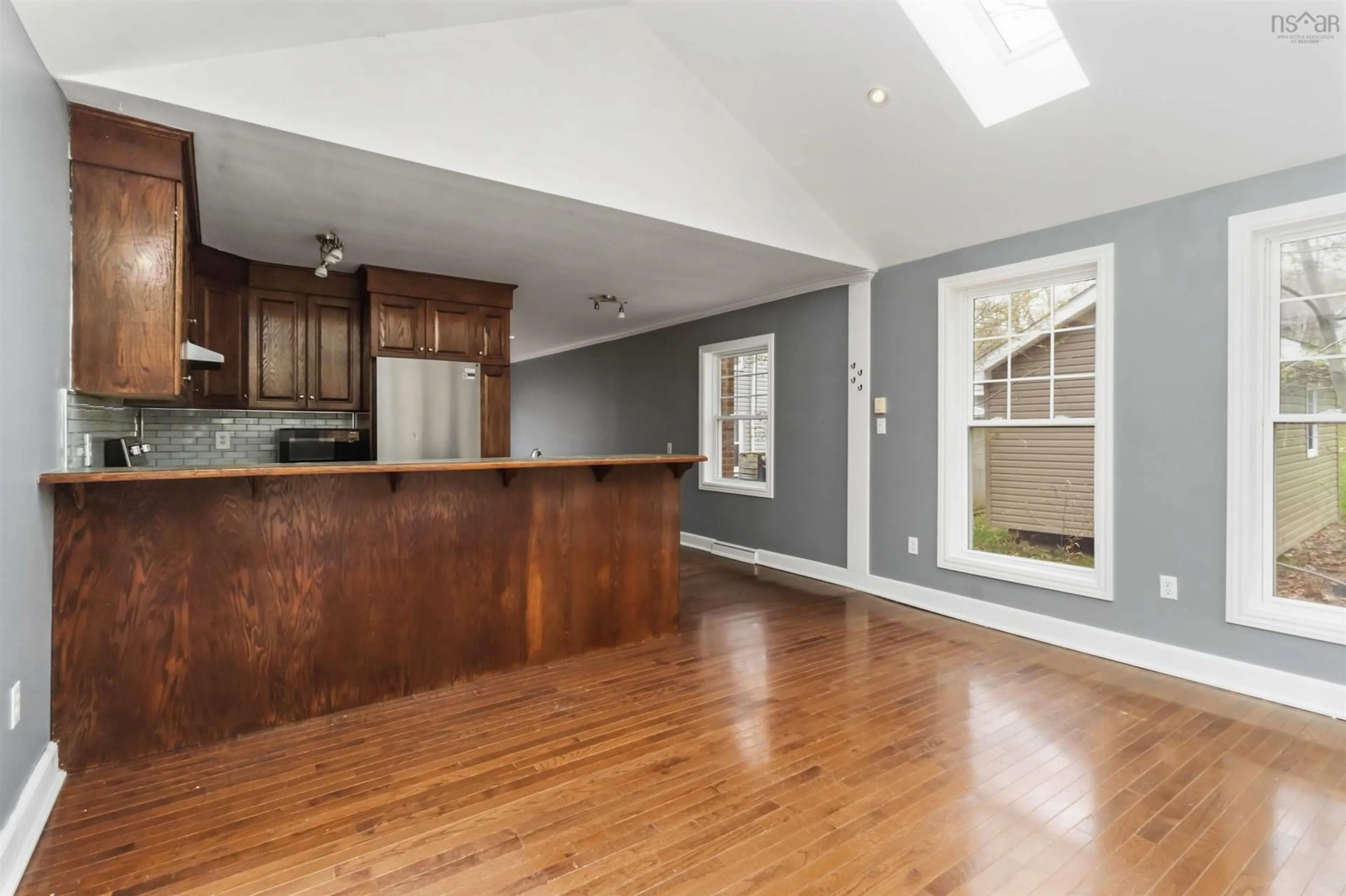 Open concept kitchen, wood/laminate floor for 91 Meadowbrook Dr, Bedford Nova Scotia B4A 1V5