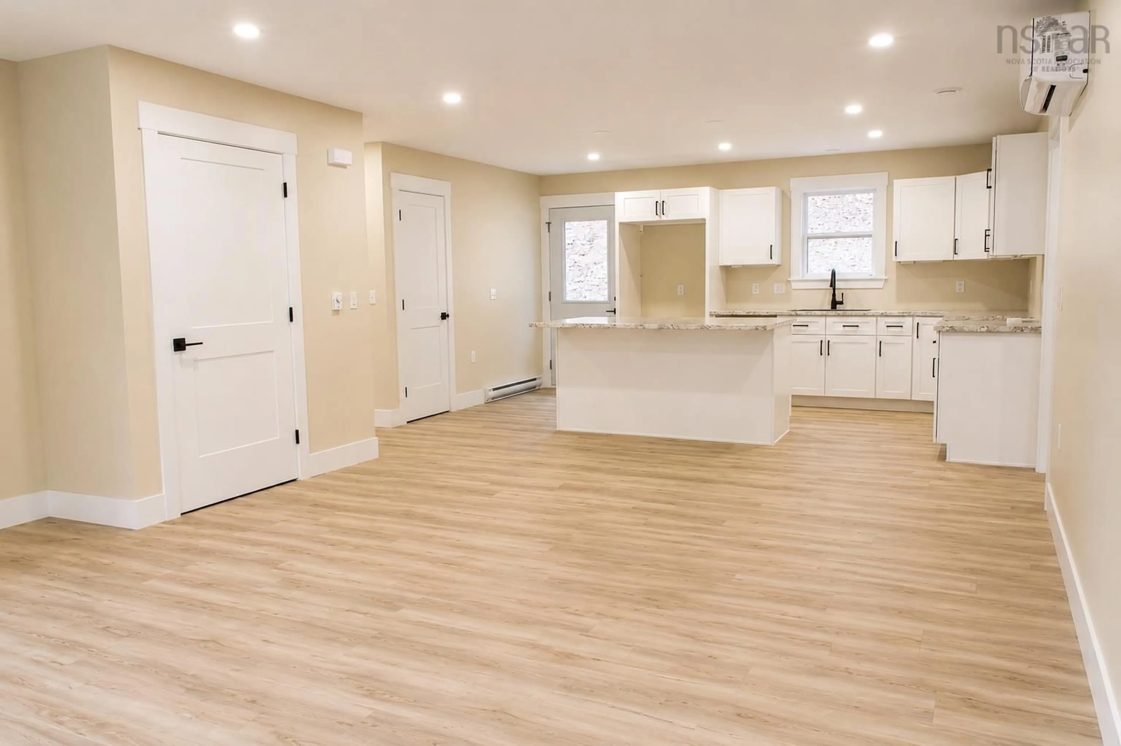 Open concept kitchen, wood/laminate floor for 17 Kara Anne, New Minas Nova Scotia B4N 0H6