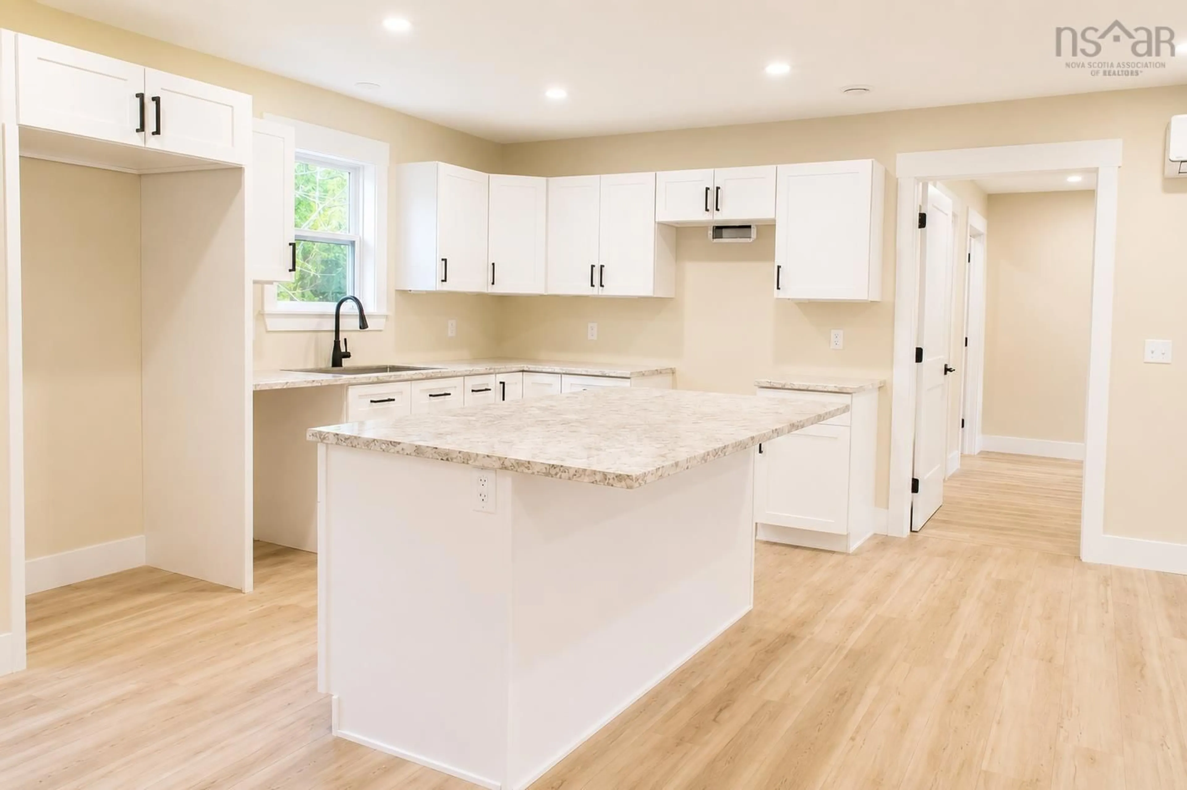Open concept kitchen, wood/laminate floor for 17 Kara Anne, New Minas Nova Scotia B4N 0H6