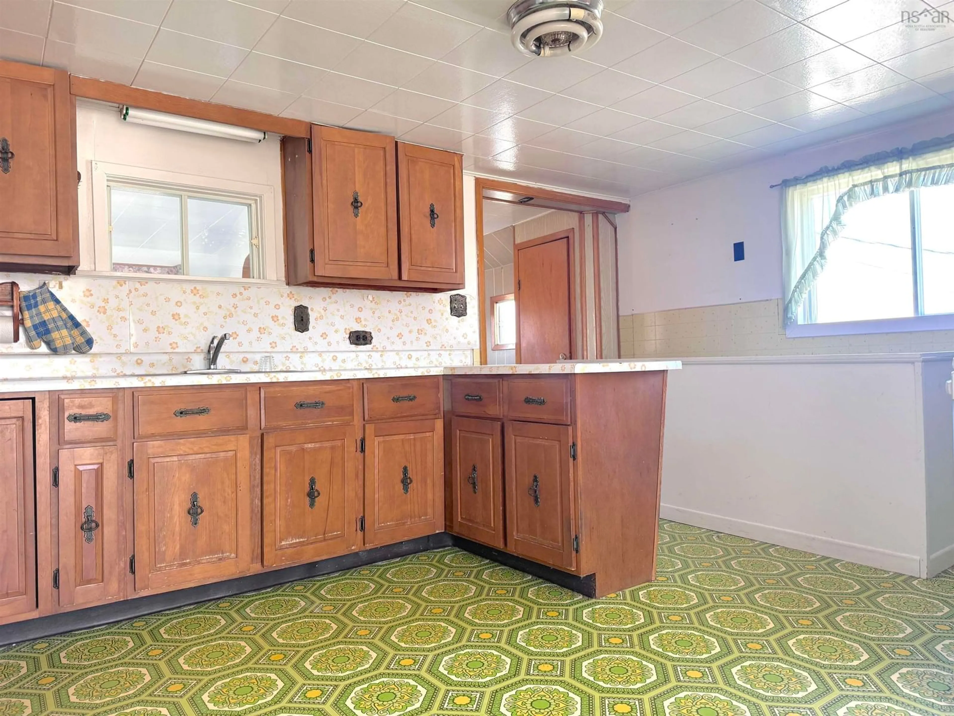 Standard kitchen, ceramic/tile floor for 568 Dingwall Rd, Dingwall Nova Scotia B0C 1G0