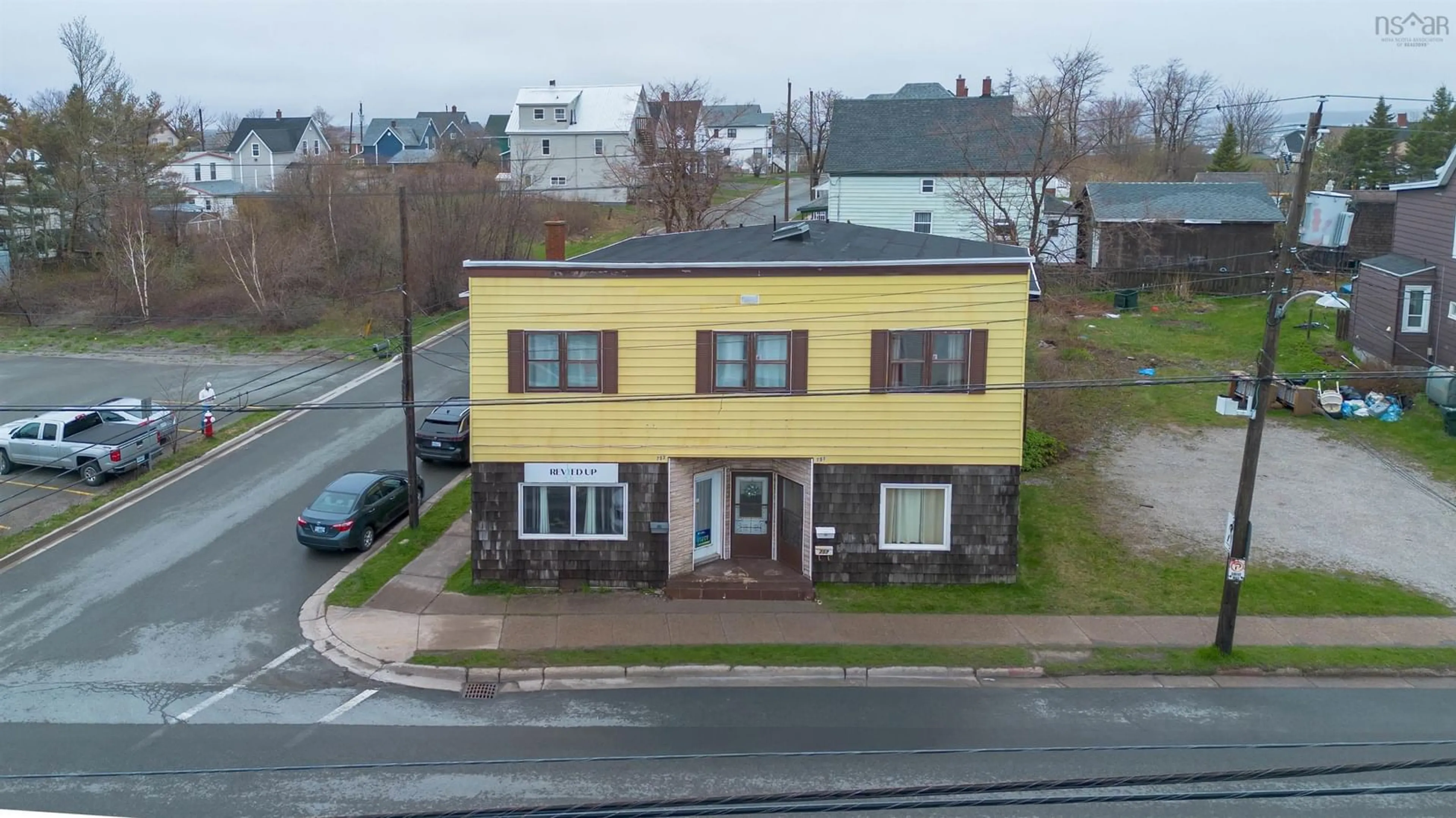 A pic from outside/outdoor area/front of a property/back of a property/a pic from drone, building for 757 Victoria Rd, Sydney Nova Scotia B1N 1J5