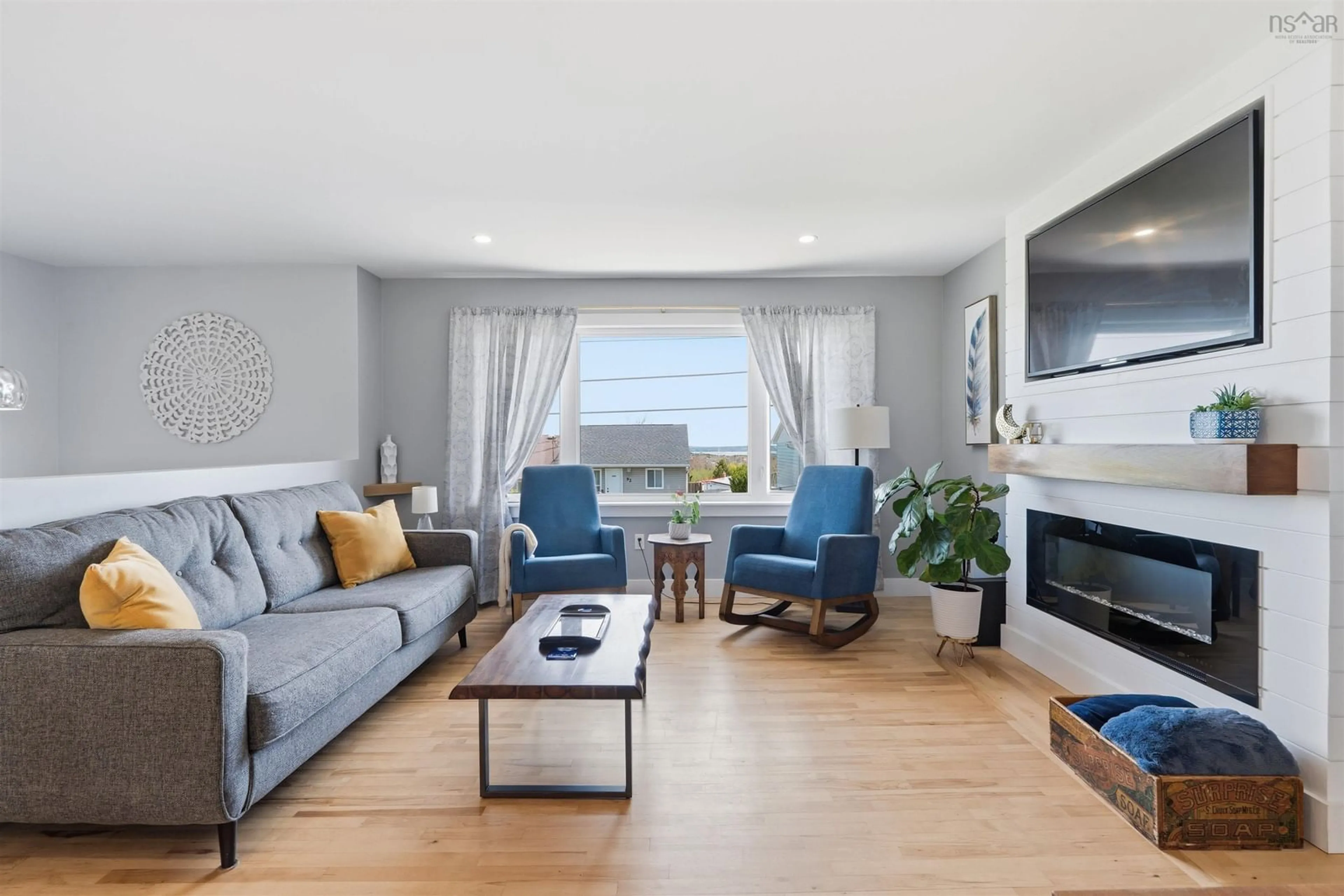 Living room with furniture, wood/laminate floor for 89 Sirius Cres, Dartmouth Nova Scotia B2W 4L4